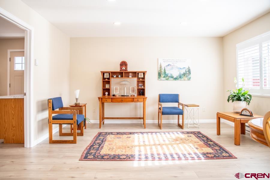 490 6403 Road Montrose, CO 81403 - Photo 16 of 40 a living room with furniture and a rug