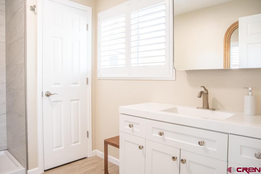 490 6403 Road Montrose, CO 81403 - Photo 22 of 40 a bathroom with a sink and a vanity