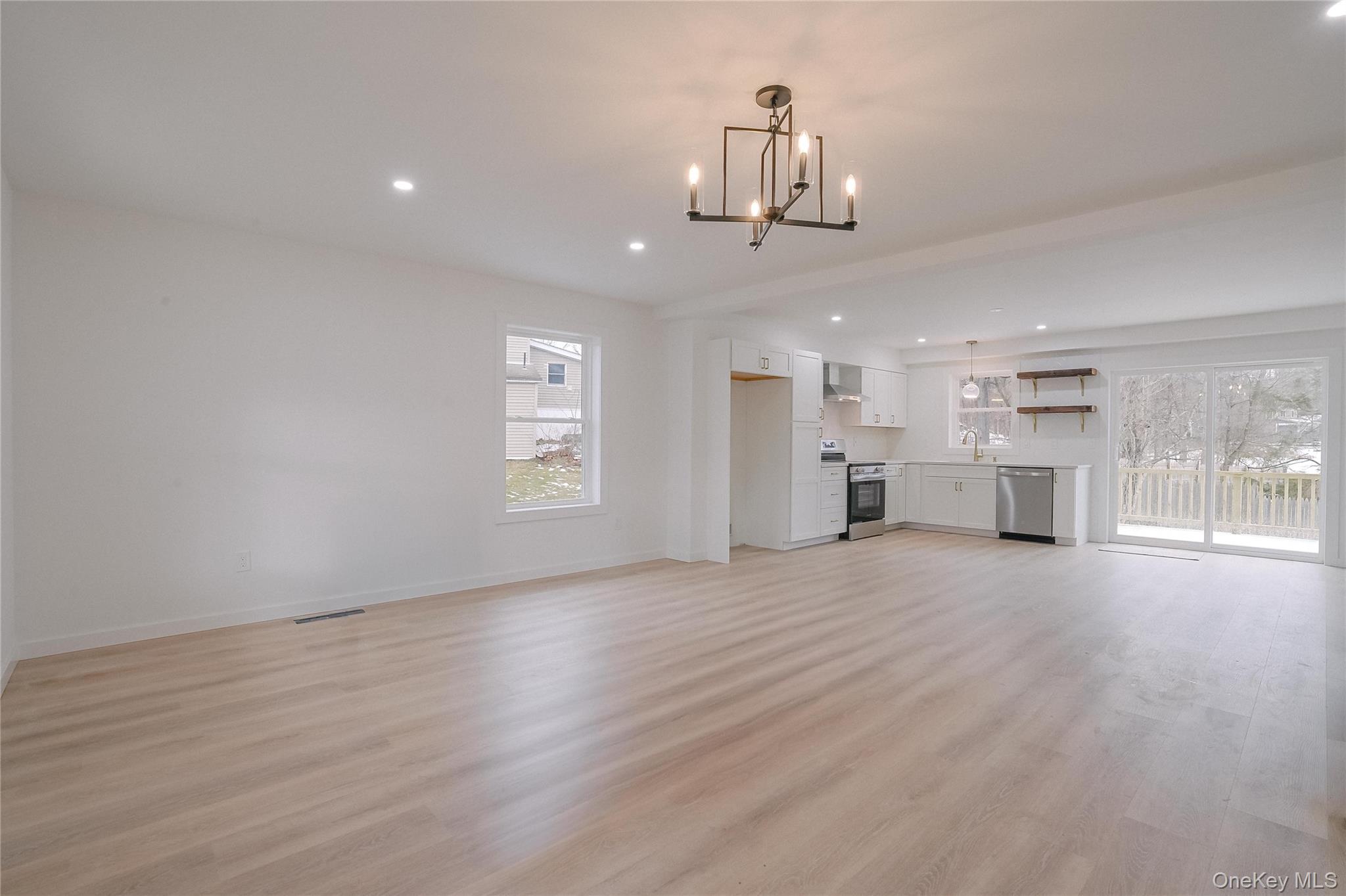 17 Maple Street Beacon, NY 12508 - Photo 12 of 35 a view of a kitchen with a sink and wooden floor
