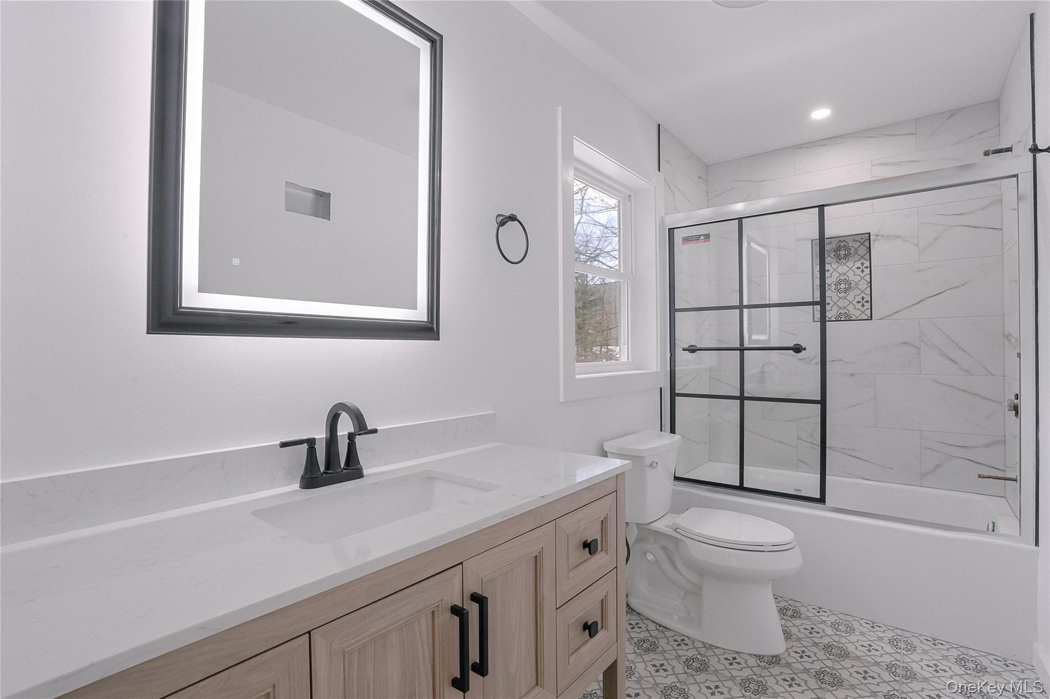 17 Maple Street Beacon, NY 12508 - Photo 19 of 39 a bathroom with a sink a toilet and shower