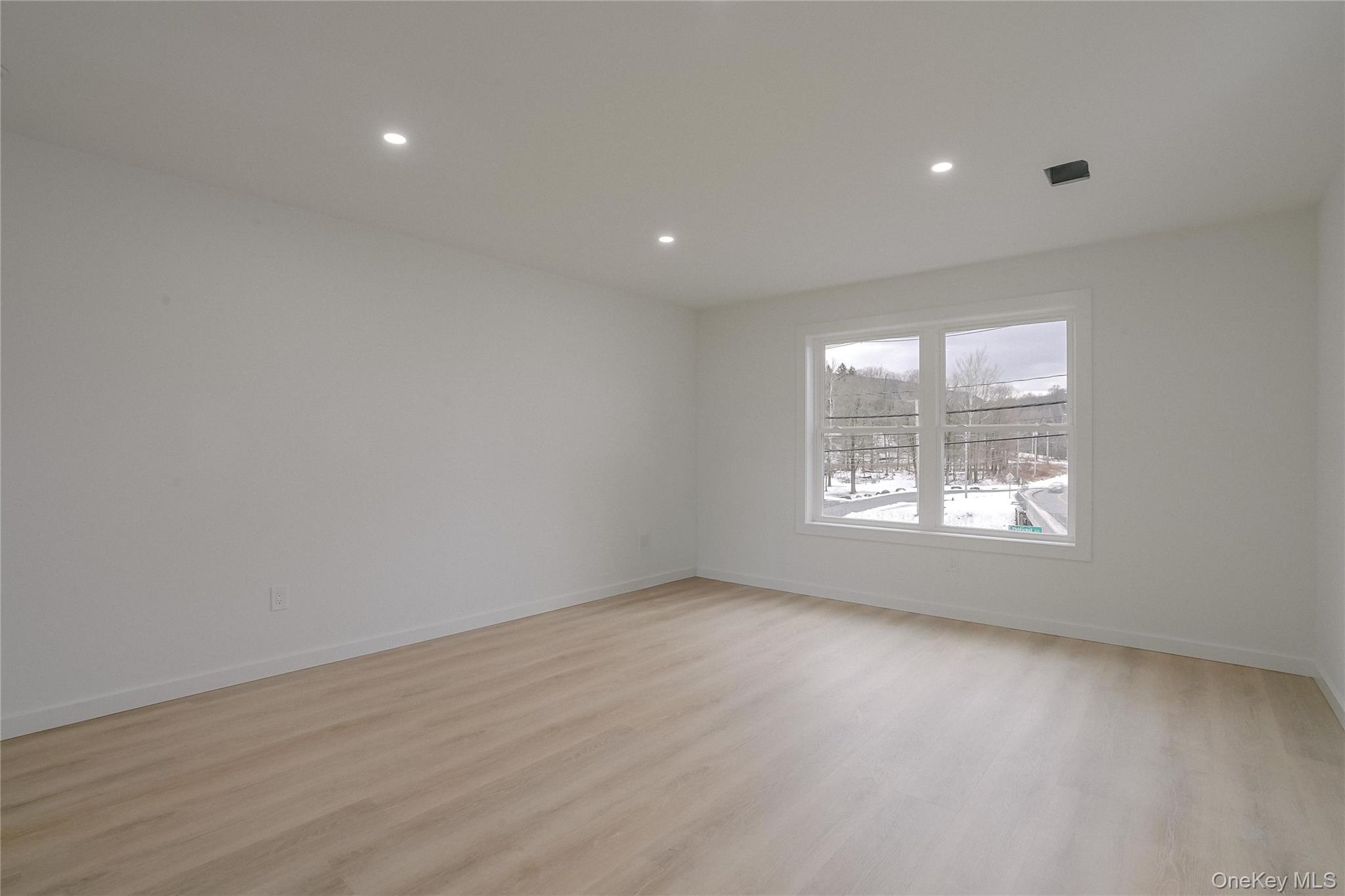17 Maple Street Beacon, NY 12508 - Photo 26 of 39 wooden floor in an empty room with a window