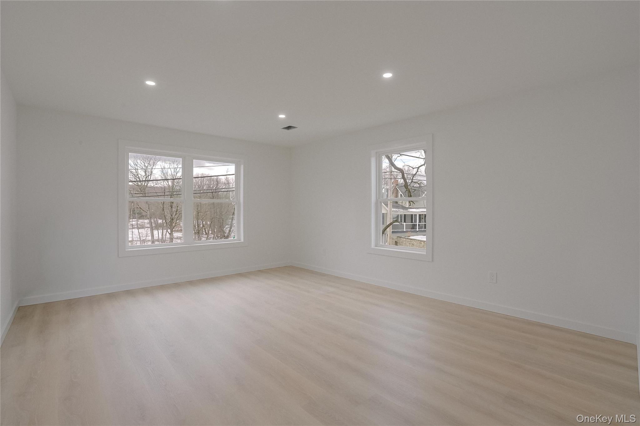 17 Maple Street Beacon, NY 12508 - Photo 27 of 38 Spare room with light wood-style flooring and recessed lighting