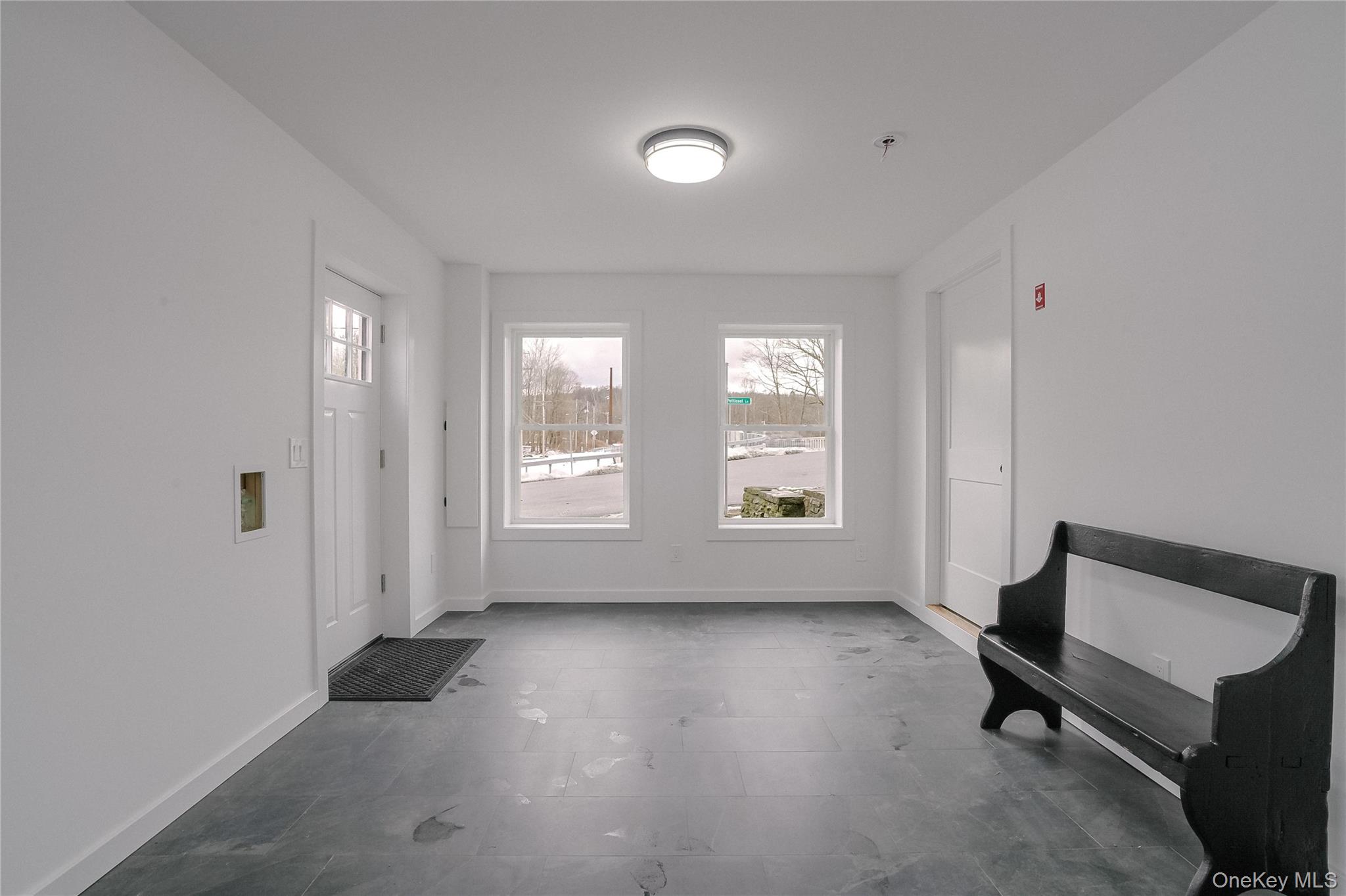 17 Maple Street Beacon, NY 12508 - Photo 30 of 35 a view of room with hardwood floor and windows