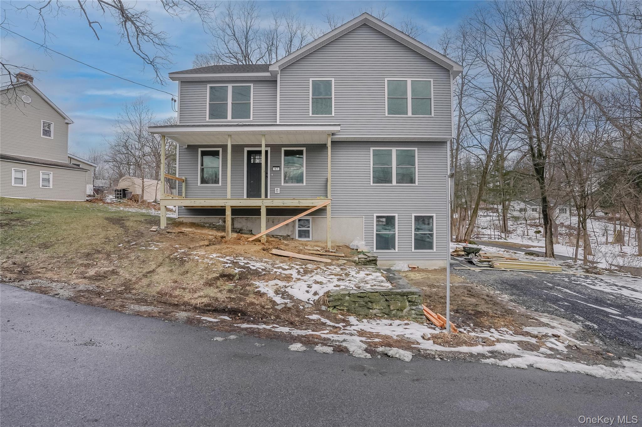 17 Maple Street Beacon, NY 12508 - Photo 32 of 39 a front view of a house with a yard