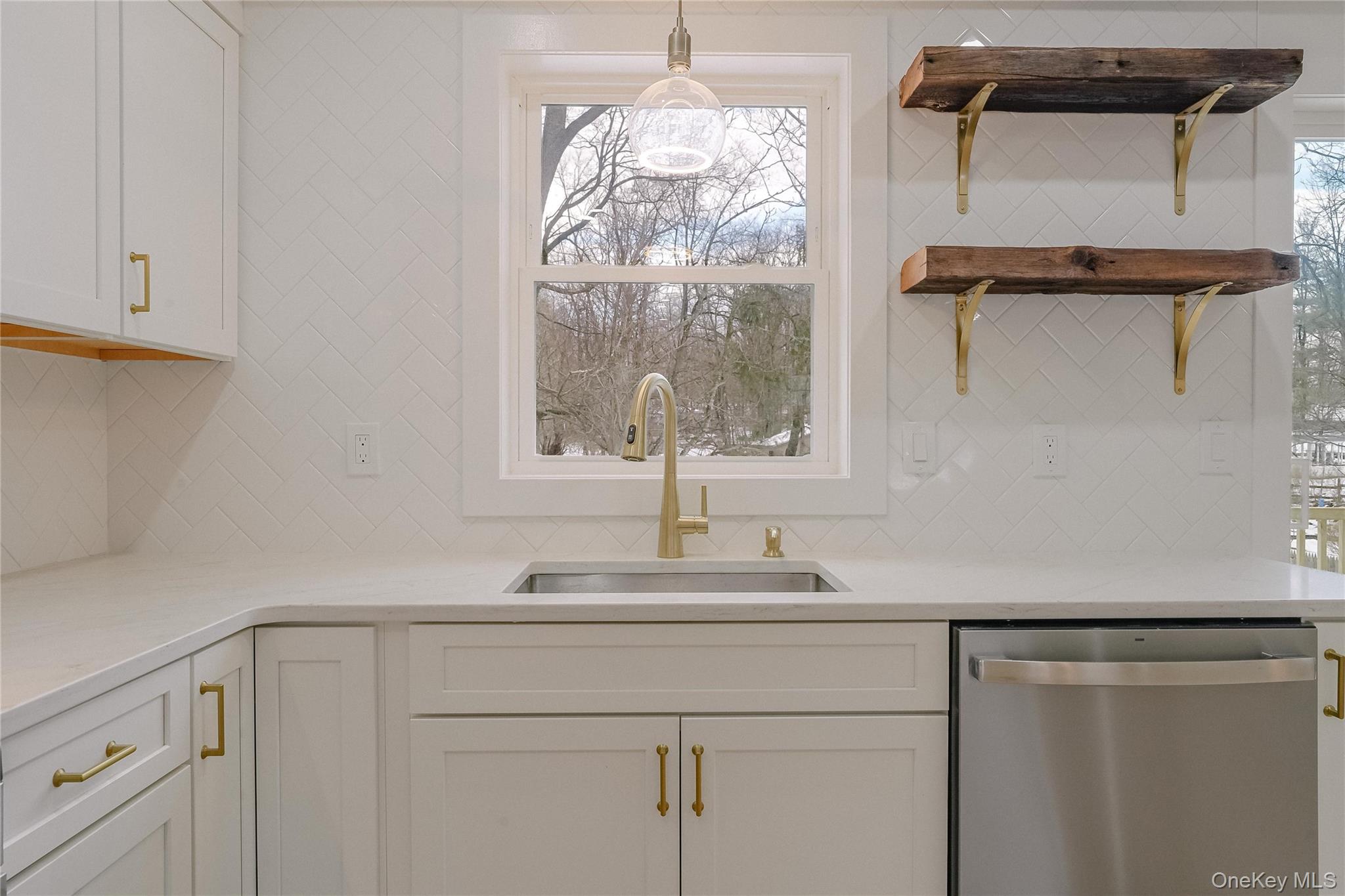 17 Maple Street Beacon, NY 12508 - Photo 6 of 35 a kitchen with a sink and a window