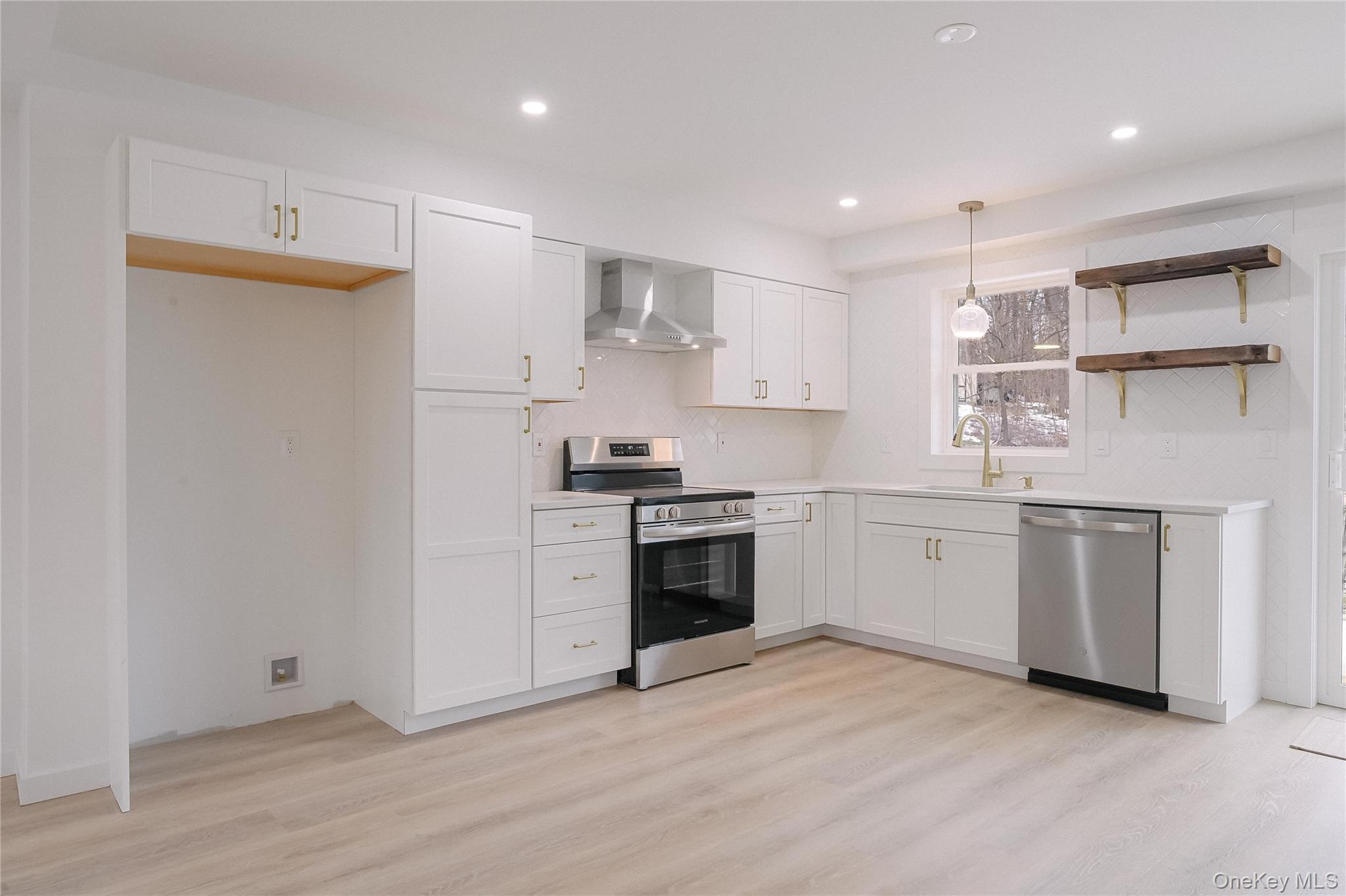 17 Maple Street Beacon, NY 12508 - Photo 7 of 38 Kitchen with stainless steel appliances, white cabinets, open shelves, and recessed lighting
