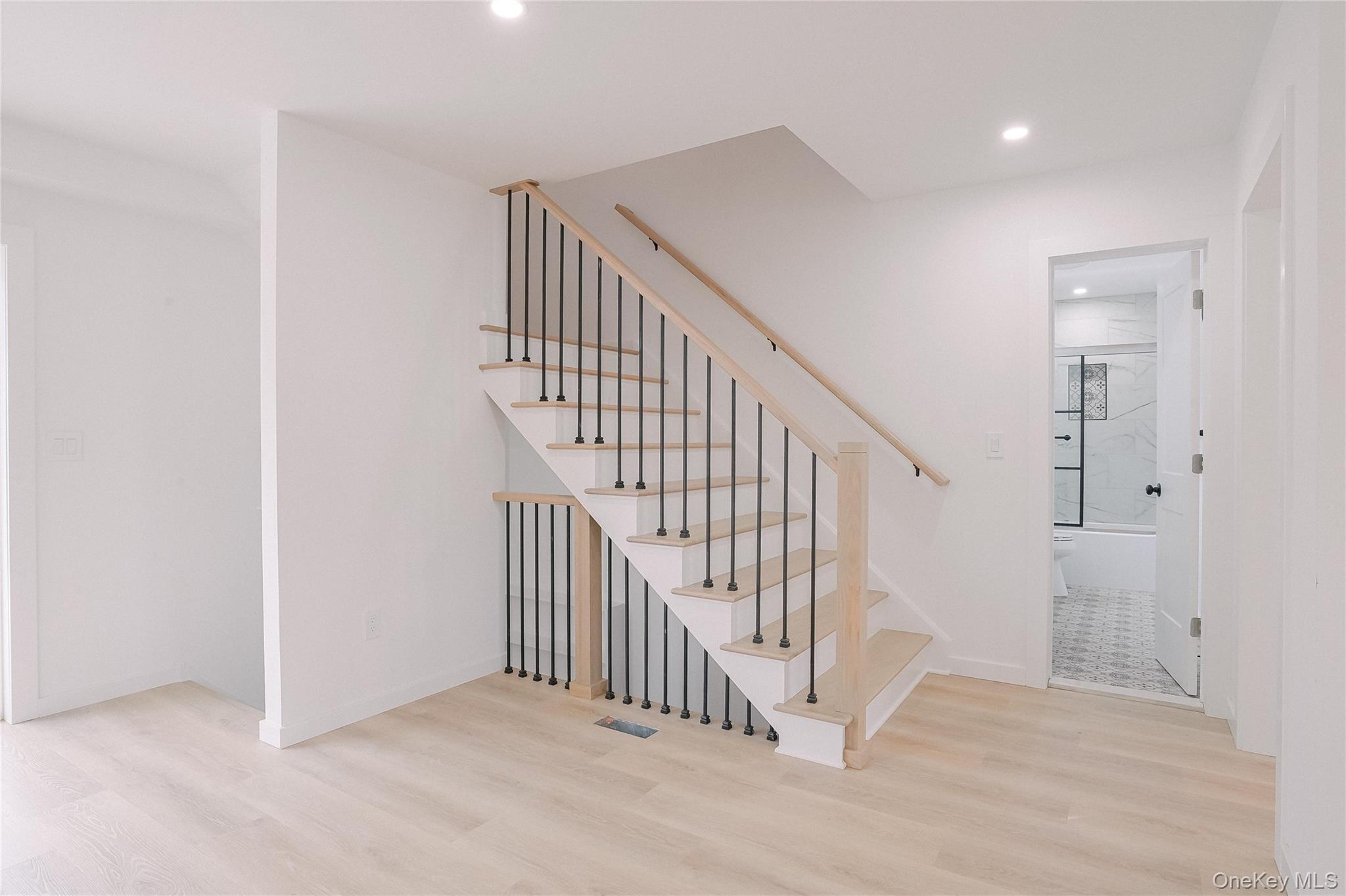 17 Maple Street Beacon, NY 12508 - Photo 8 of 38 Stairway featuring wood finished floors and recessed lighting
