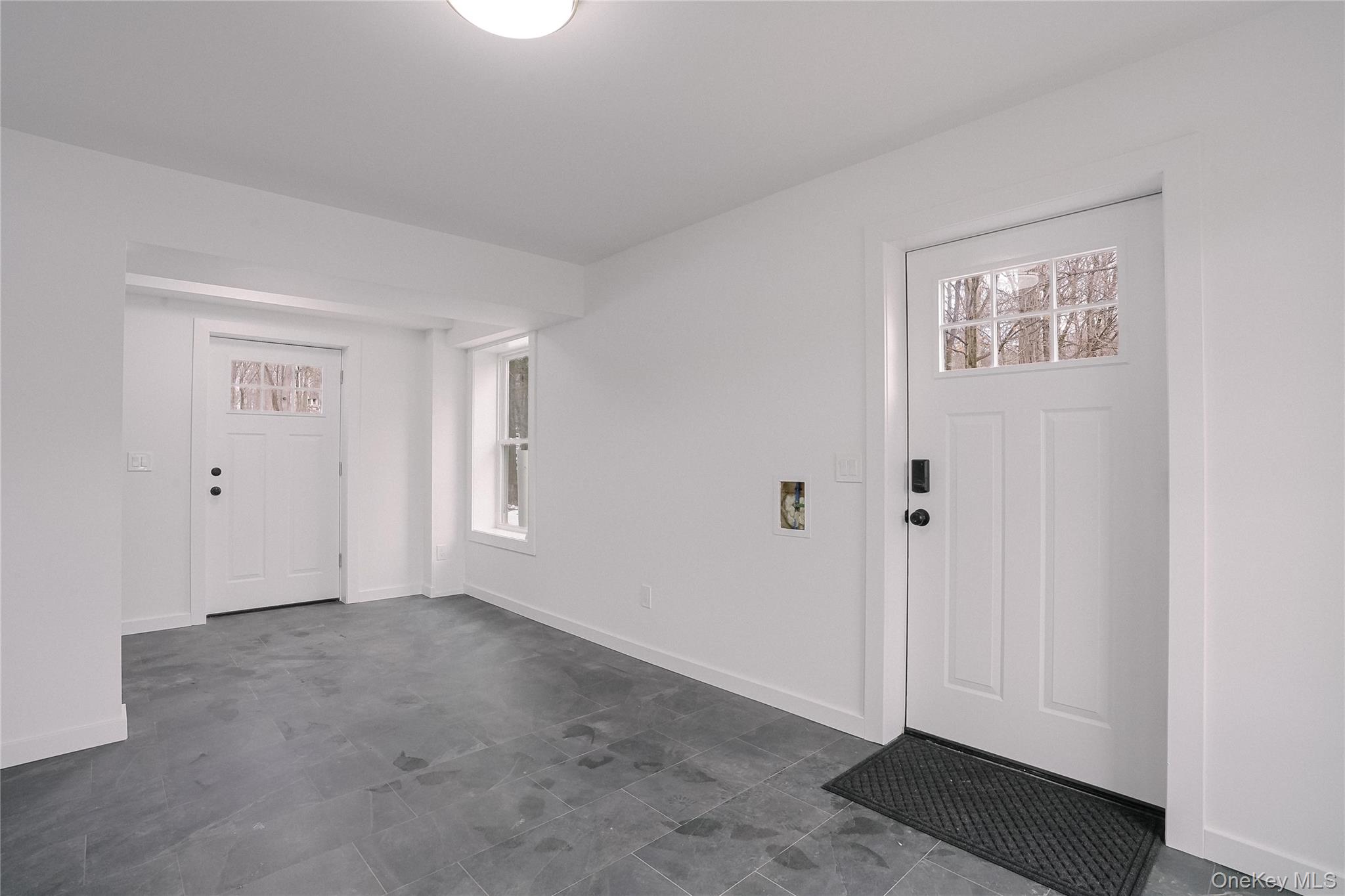 17 Maple Street Beacon, NY 12508 - Photo 10 of 39 an empty room with windows