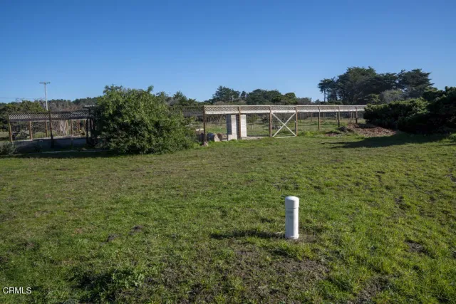 a view of a house with a garden