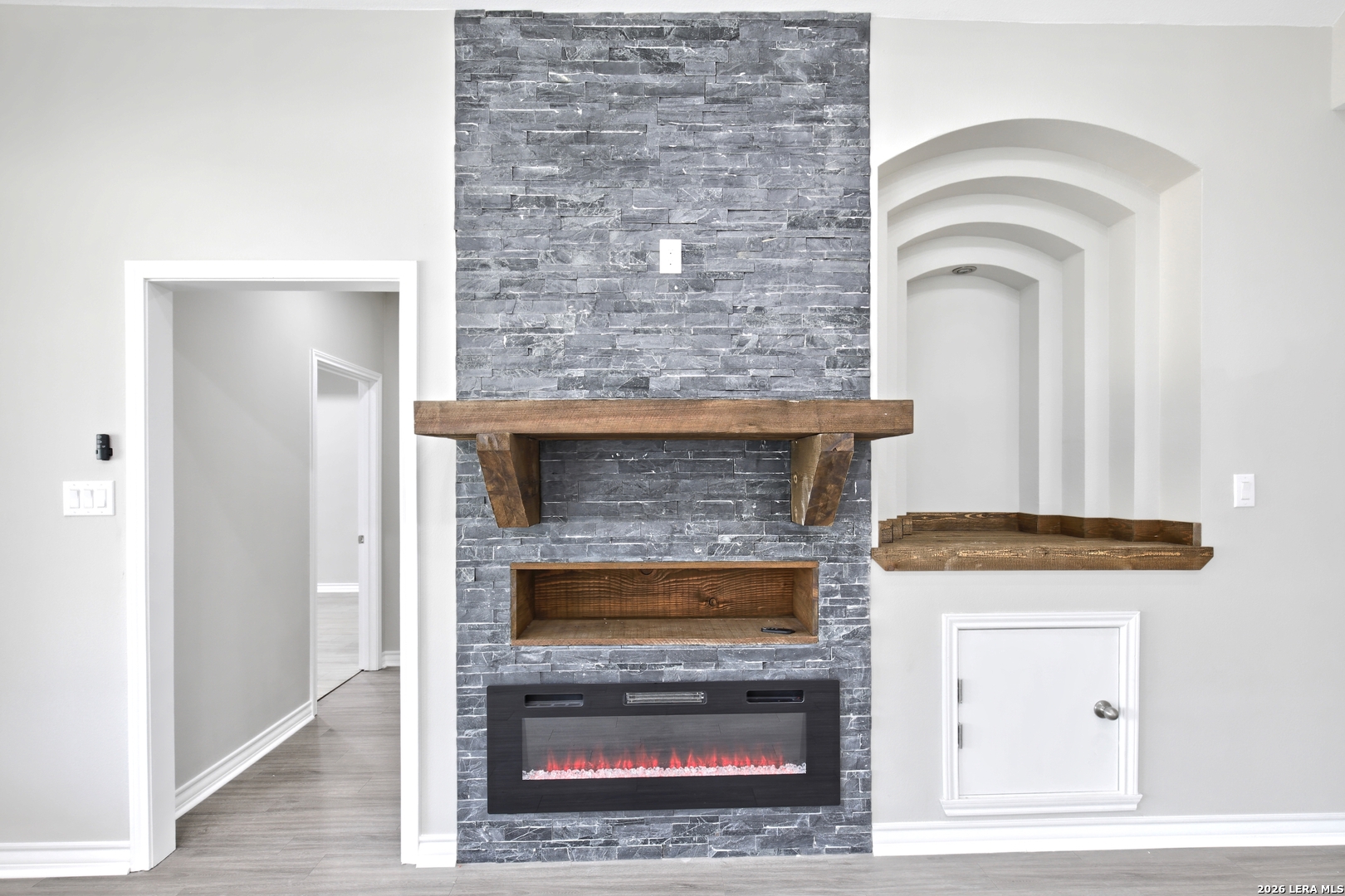 918 Marbach Road Somerset, TX 78069 - Photo 17 of 36 a living room with a fireplace and a fireplace