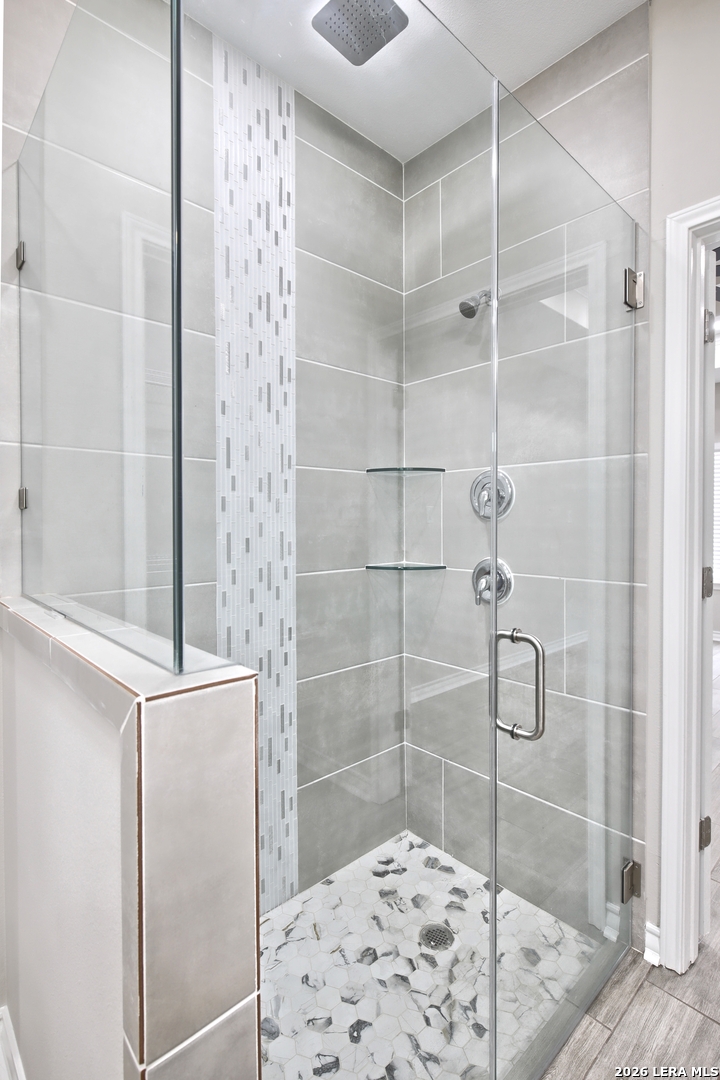 918 Marbach Road Somerset, TX 78069 - Photo 21 of 36 a bathroom with a shower and a sink