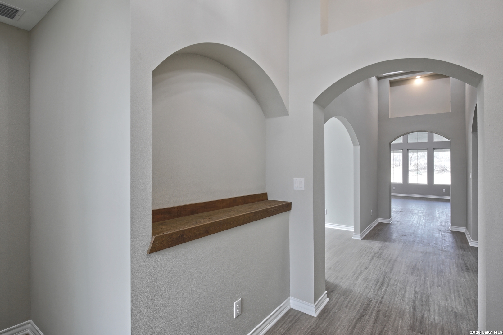 918 Marbach Road Somerset, TX 78069 - Photo 3 of 36 wooden floor in an empty room with a window