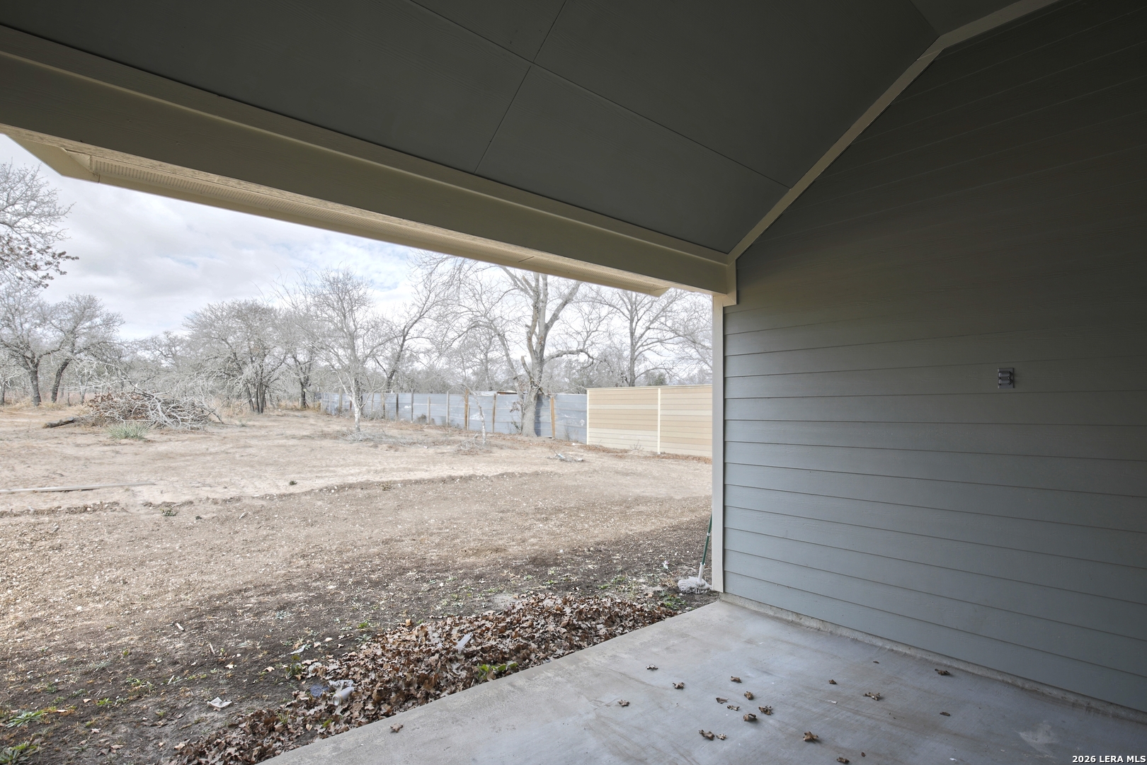 918 Marbach Road Somerset, TX 78069 - Photo 31 of 36 a view of backyard and tree