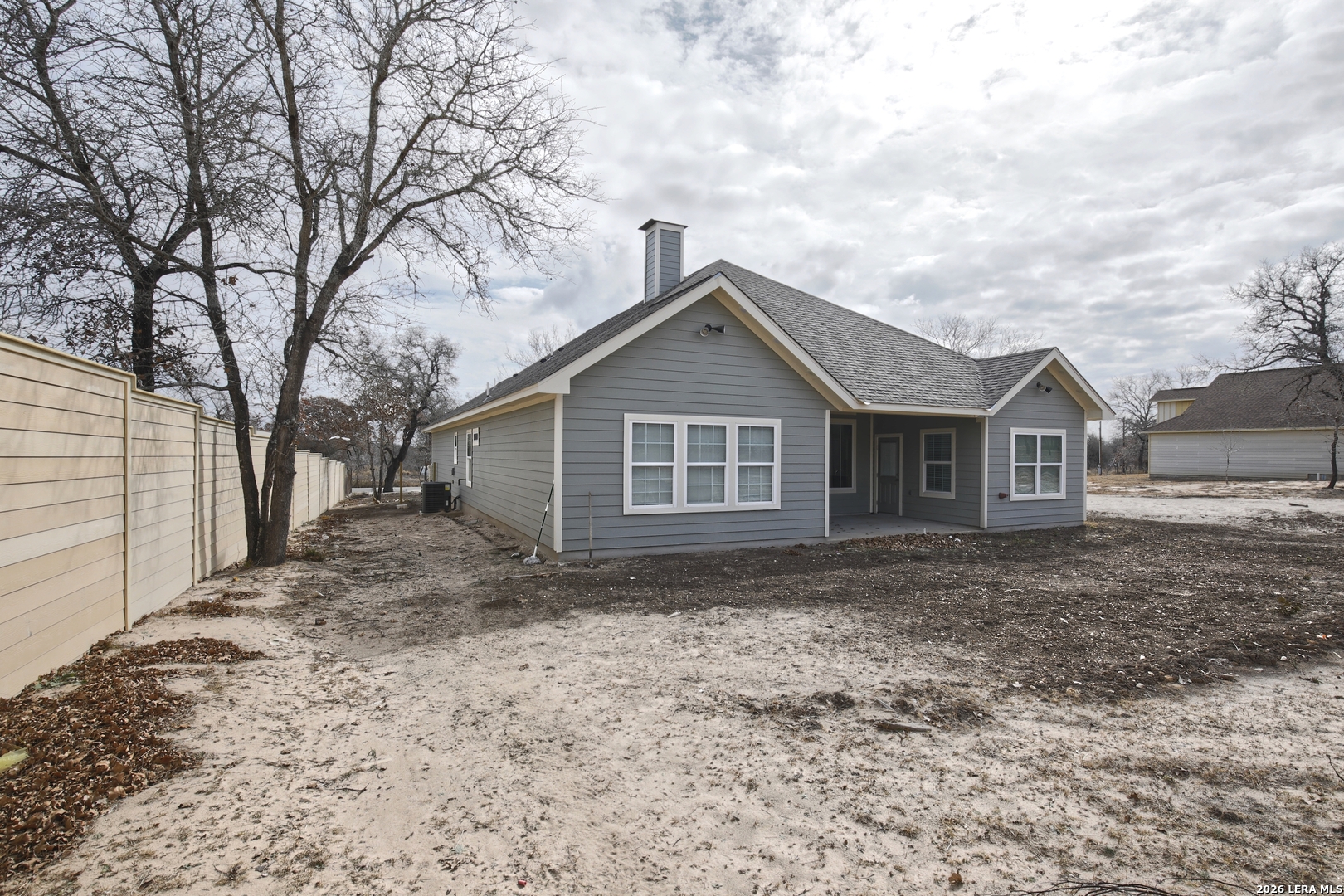 918 Marbach Road Somerset, TX 78069 - Photo 33 of 36 a front view of a house with a yard