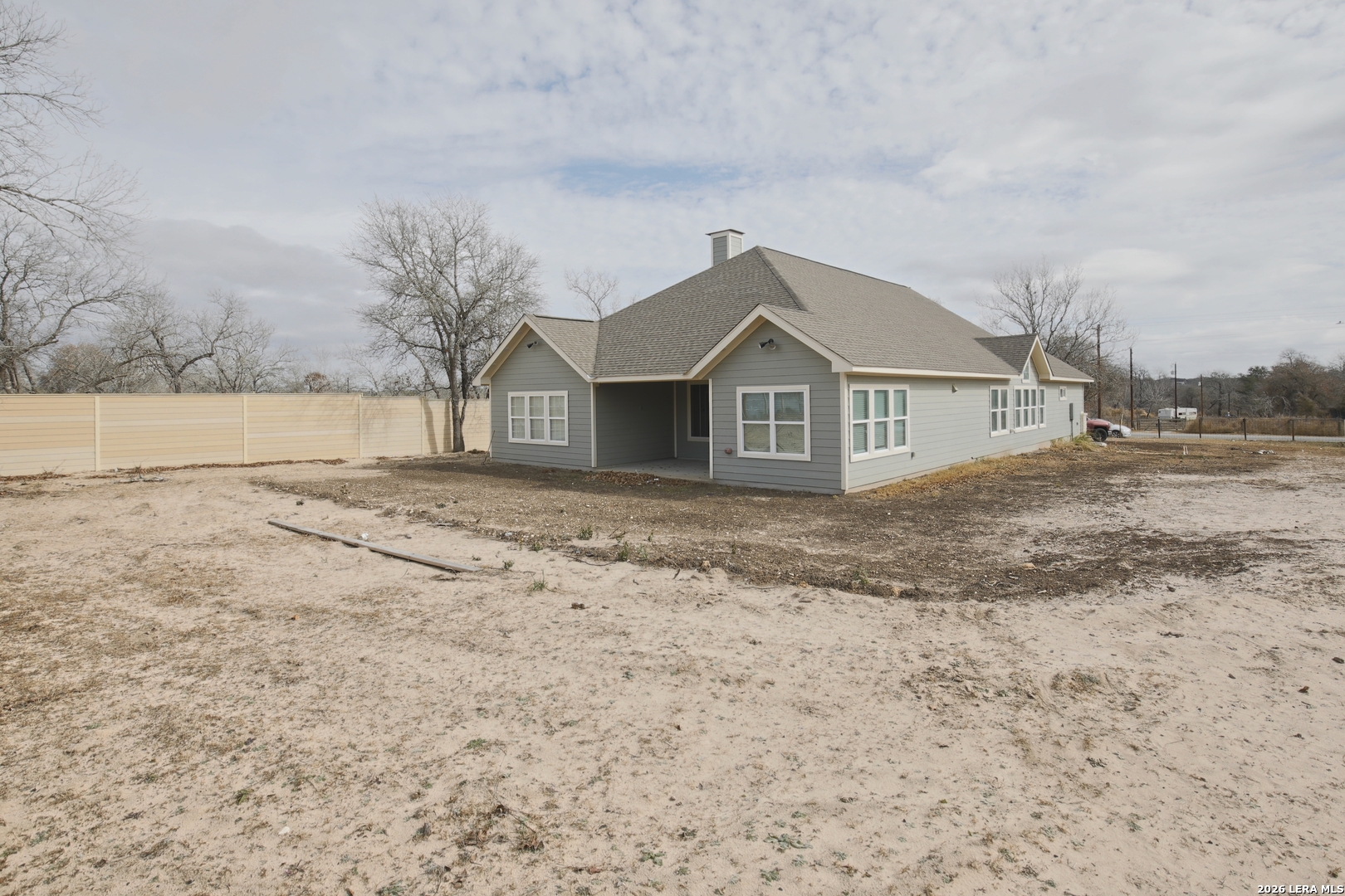 918 Marbach Road Somerset, TX 78069 - Photo 34 of 36 a big house with a big yard and large trees