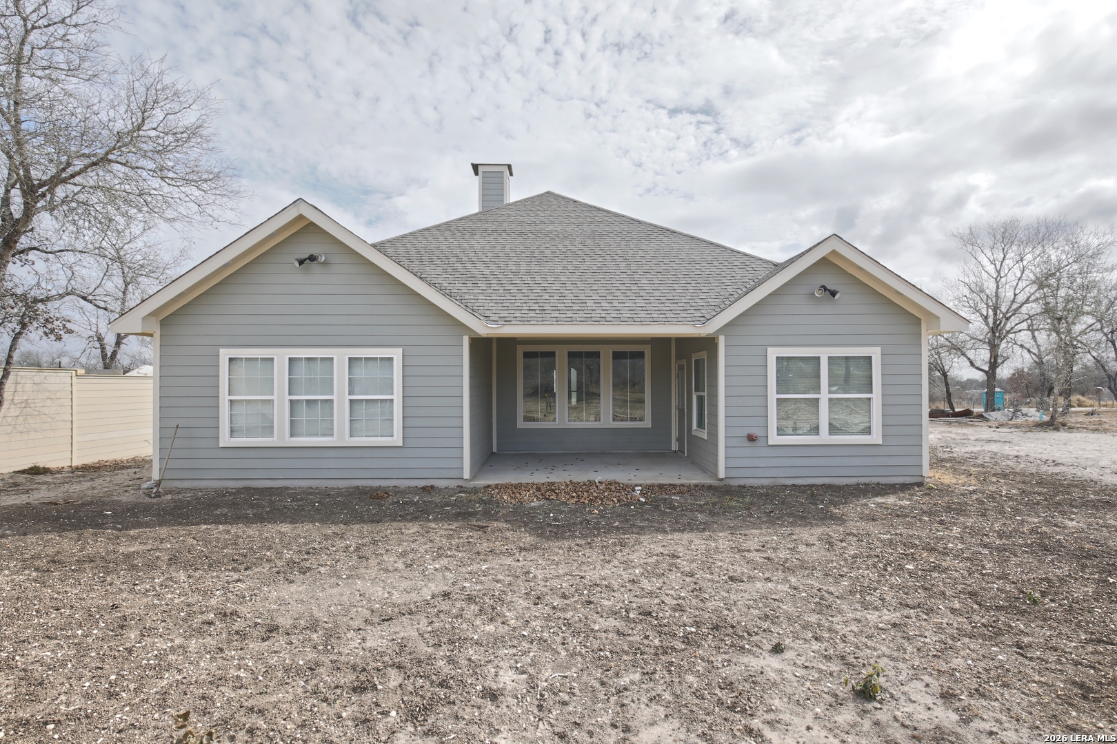 918 Marbach Road Somerset, TX 78069 - Photo 35 of 36 a front view of a house with a garden
