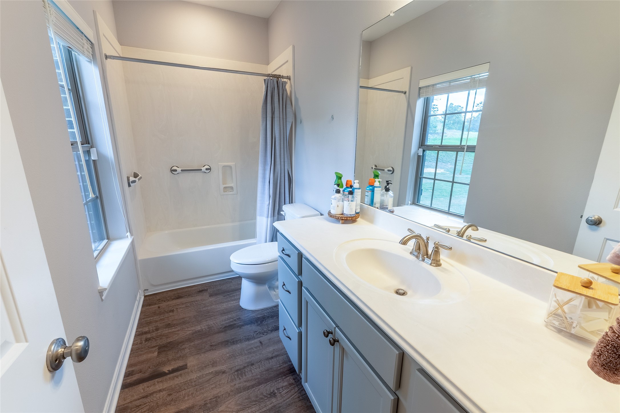 120 Sanctuary Road Huntsville, TX 77340 - Photo 19 of 38 a bathroom with a sink and a mirror