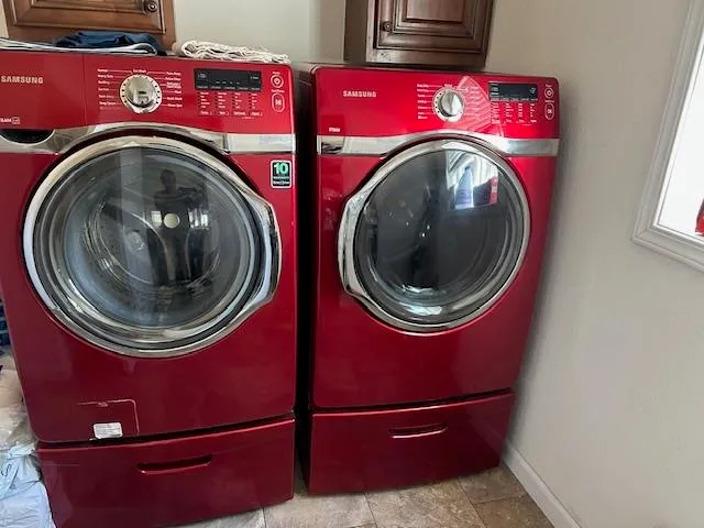 a utility room with dryer and washer