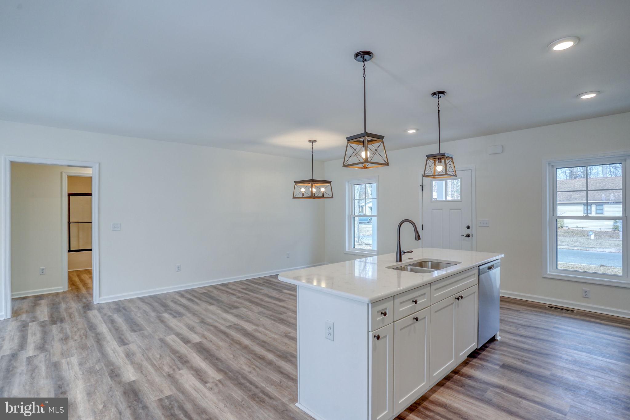 156 Pratts Branch Road Felton, DE 19943 - Photo 14 of 35 a bathroom with a sink a vanity and a mirror