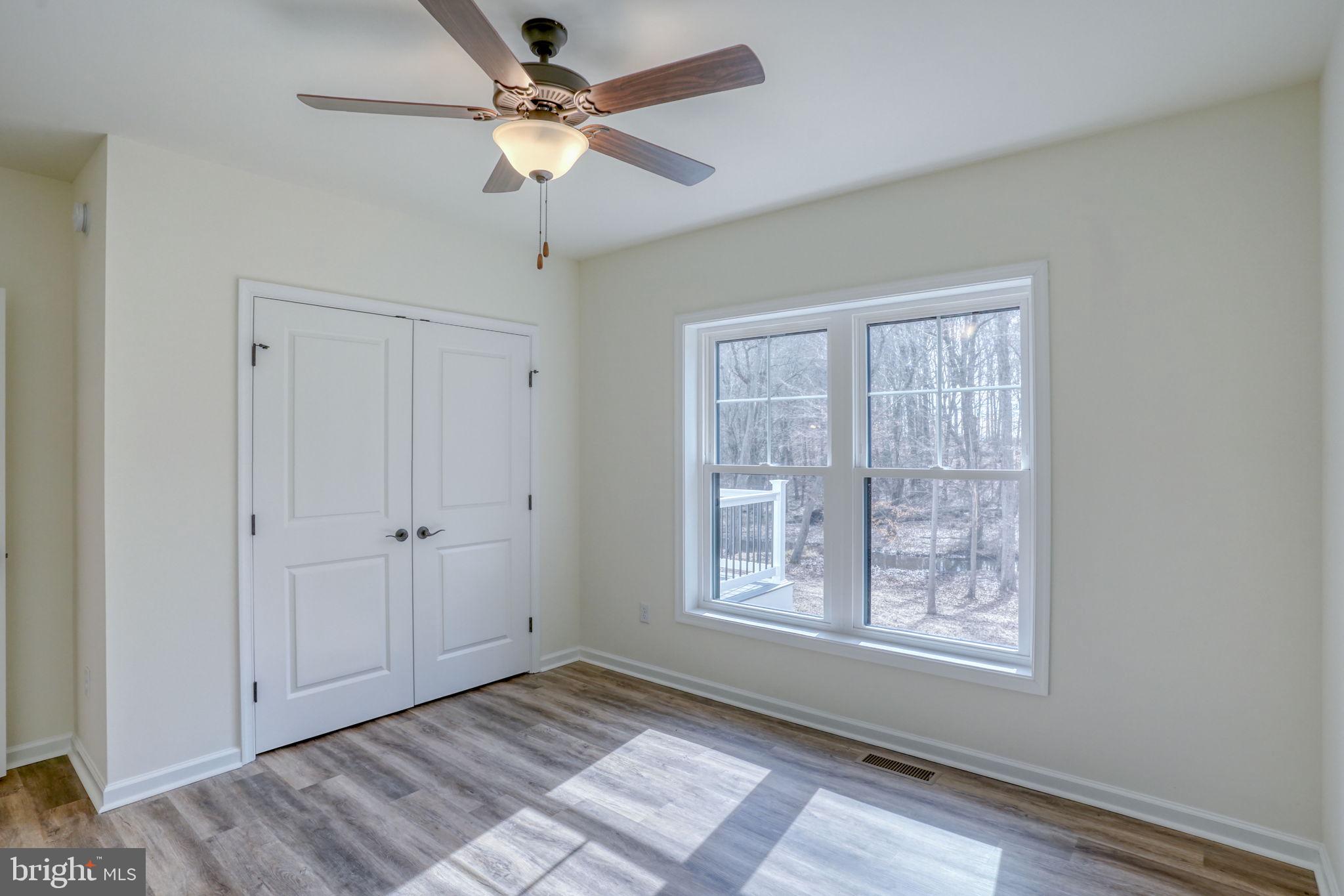 156 Pratts Branch Road Felton, DE 19943 - Photo 22 of 35 a view of an empty room with a window