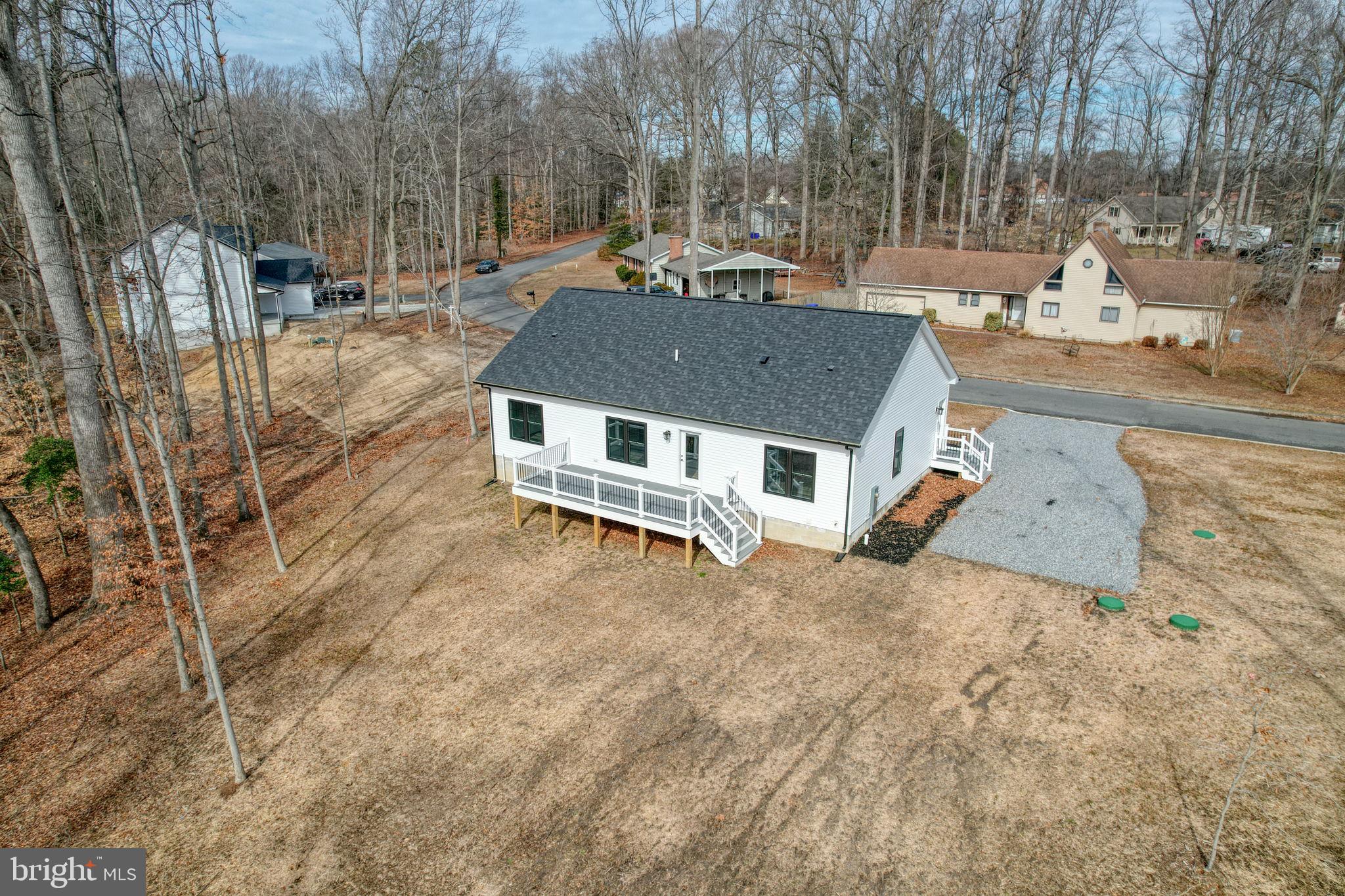 156 Pratts Branch Road Felton, DE 19943 - Photo 31 of 35 an aerial view of residential houses with yard and trees