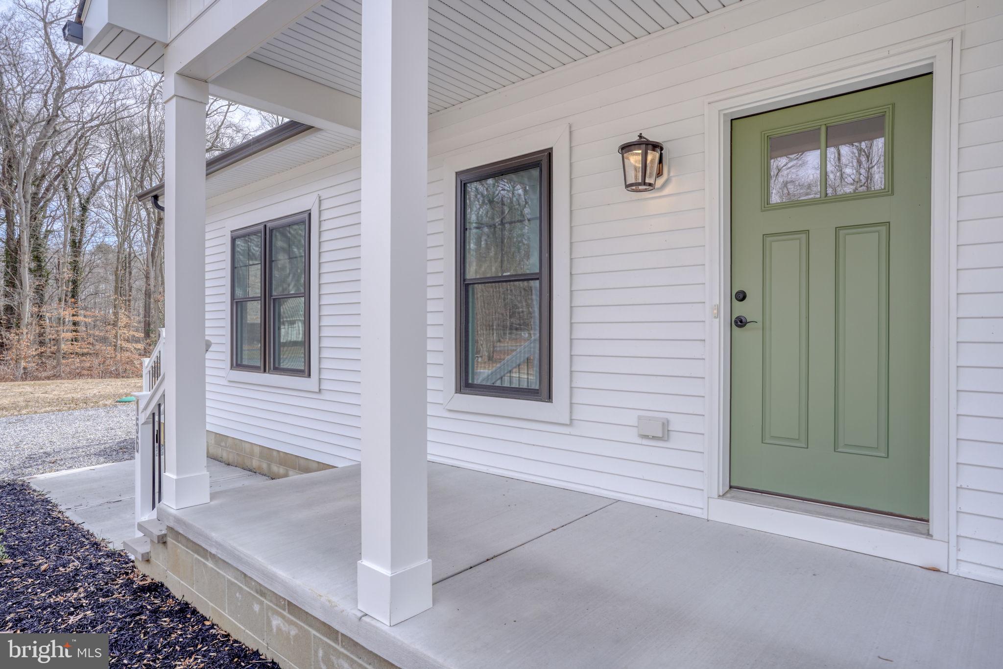 156 Pratts Branch Road Felton, DE 19943 - Photo 6 of 35 a view of front door of house