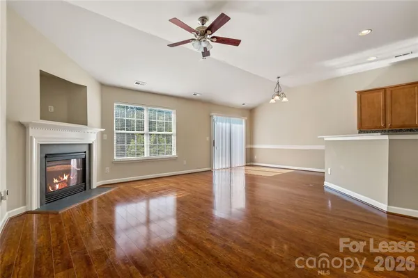 a view of kitchen and wooden floor
