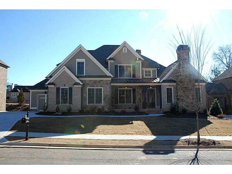 12721 Ruth's Farm Way Alpharetta, GA 30004 - Photo 1 of 1 Exterior Front. Beautiful Exterior 4 sides brick, shake and hand cut stone. Covered front Porch, 3 car garage!