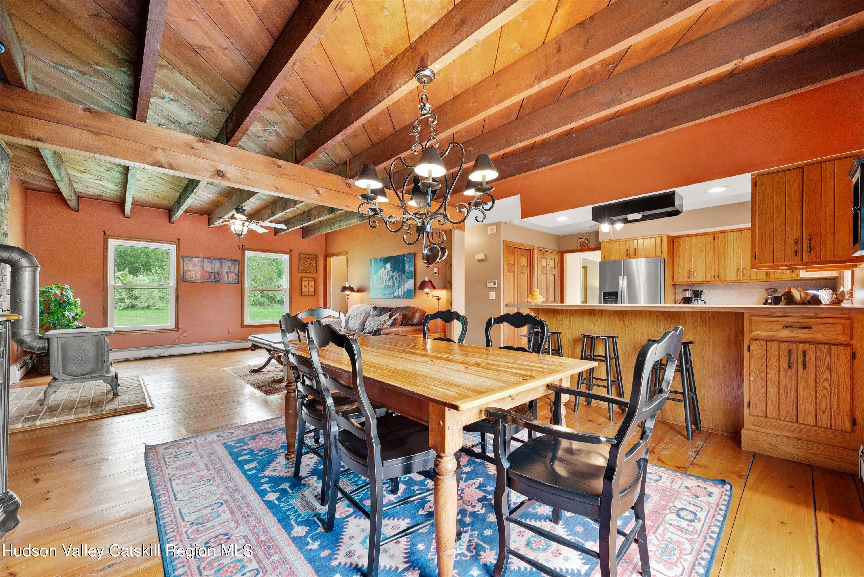 141 East Ridge Road Warwick, NY 10990 - Photo 16 of 57 a view of a dining room with furniture and wooden floor