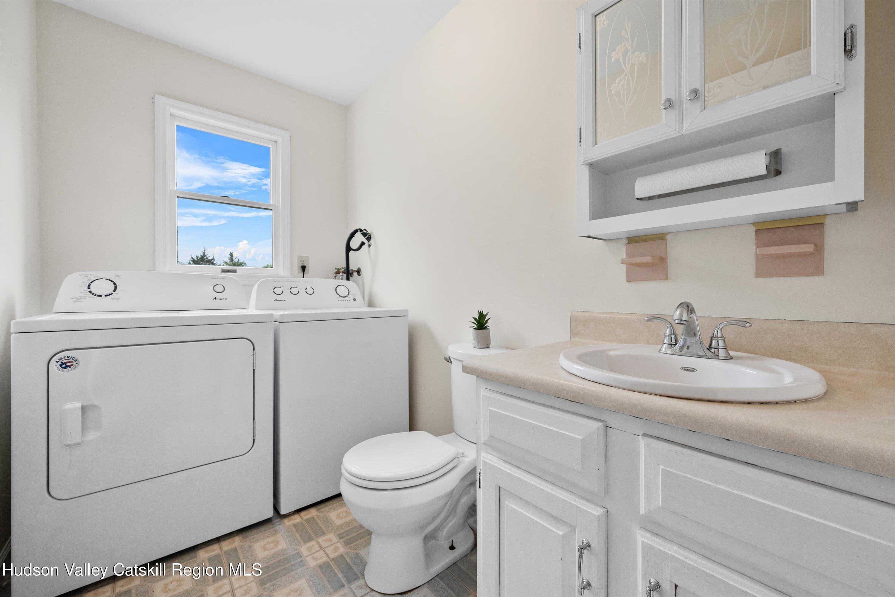 141 East Ridge Road Warwick, NY 10990 - Photo 26 of 57 a bathroom with a toilet sink and mirror