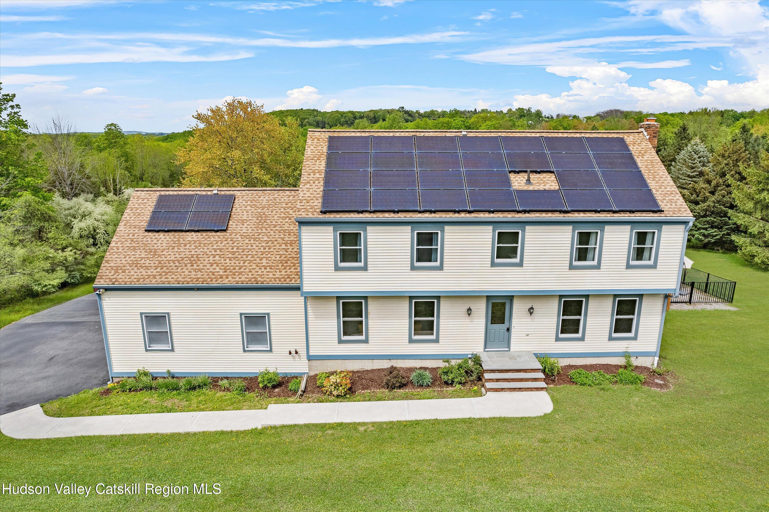 141 East Ridge Road Warwick, NY 10990 - Photo 3 of 57 a front view of a house with a yard