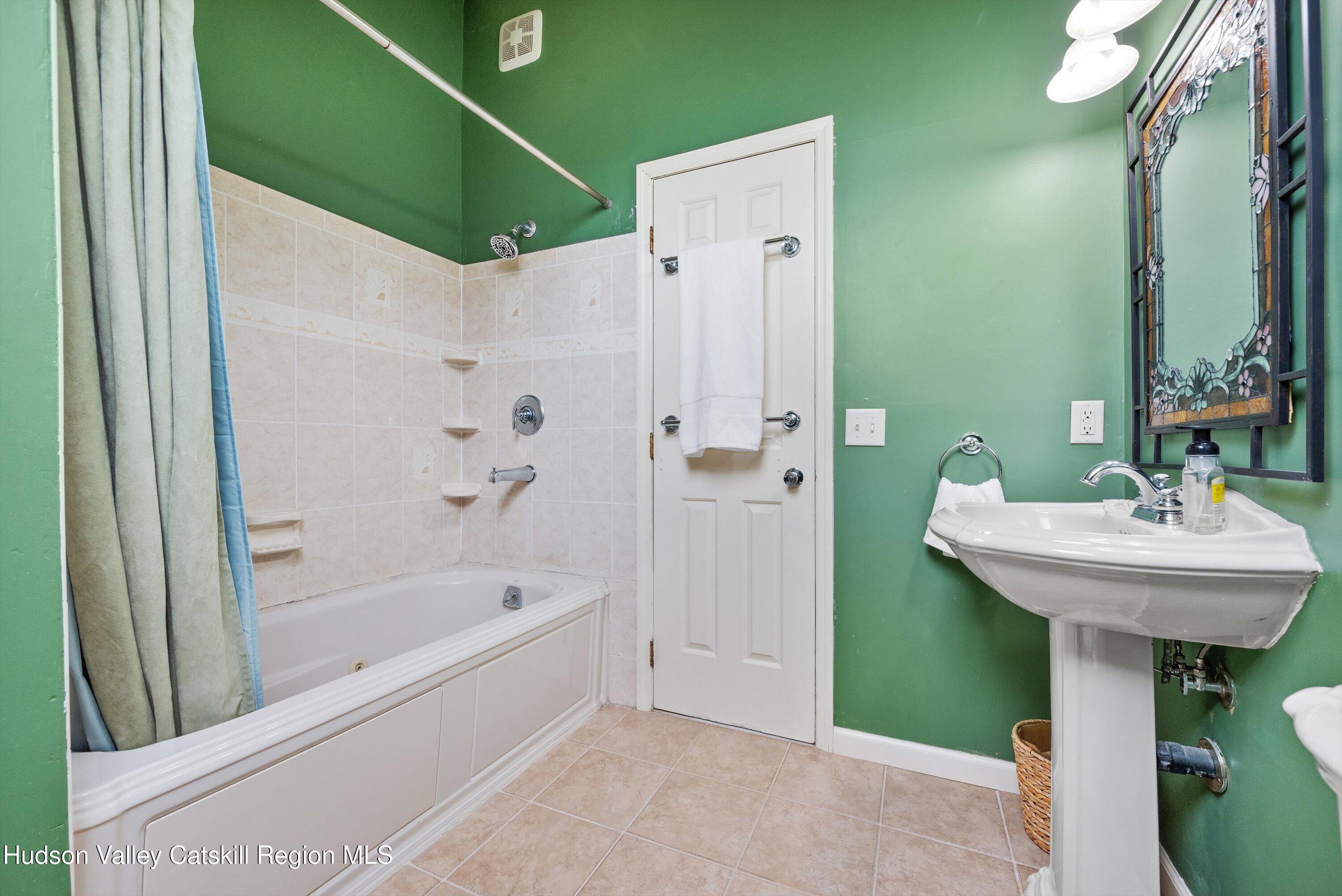 141 East Ridge Road Warwick, NY 10990 - Photo 34 of 57 a bathroom with a sink and a bathtub