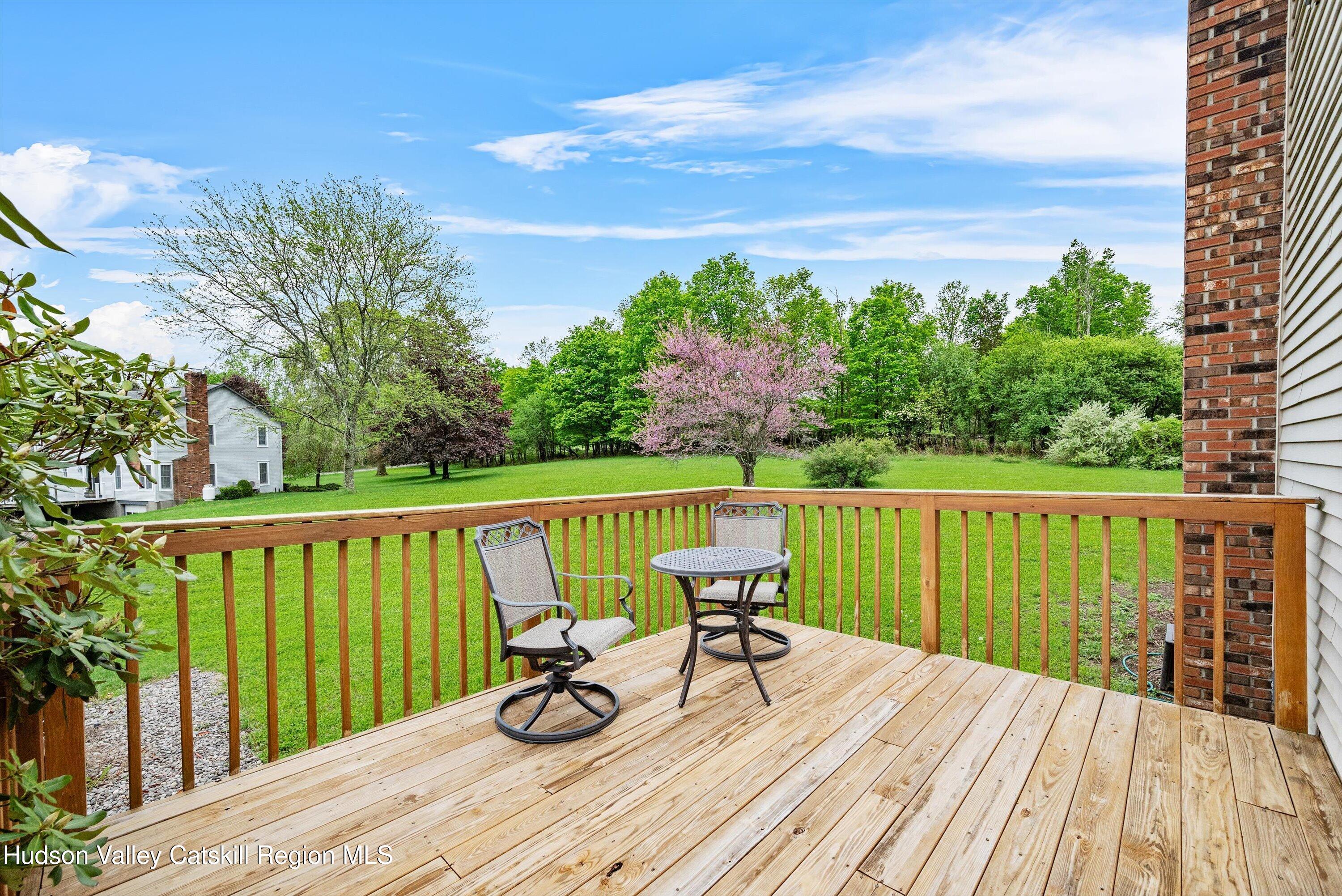 141 East Ridge Road Warwick, NY 10990 - Photo 40 of 57 a view of a balcony with wooden floor and iron fence