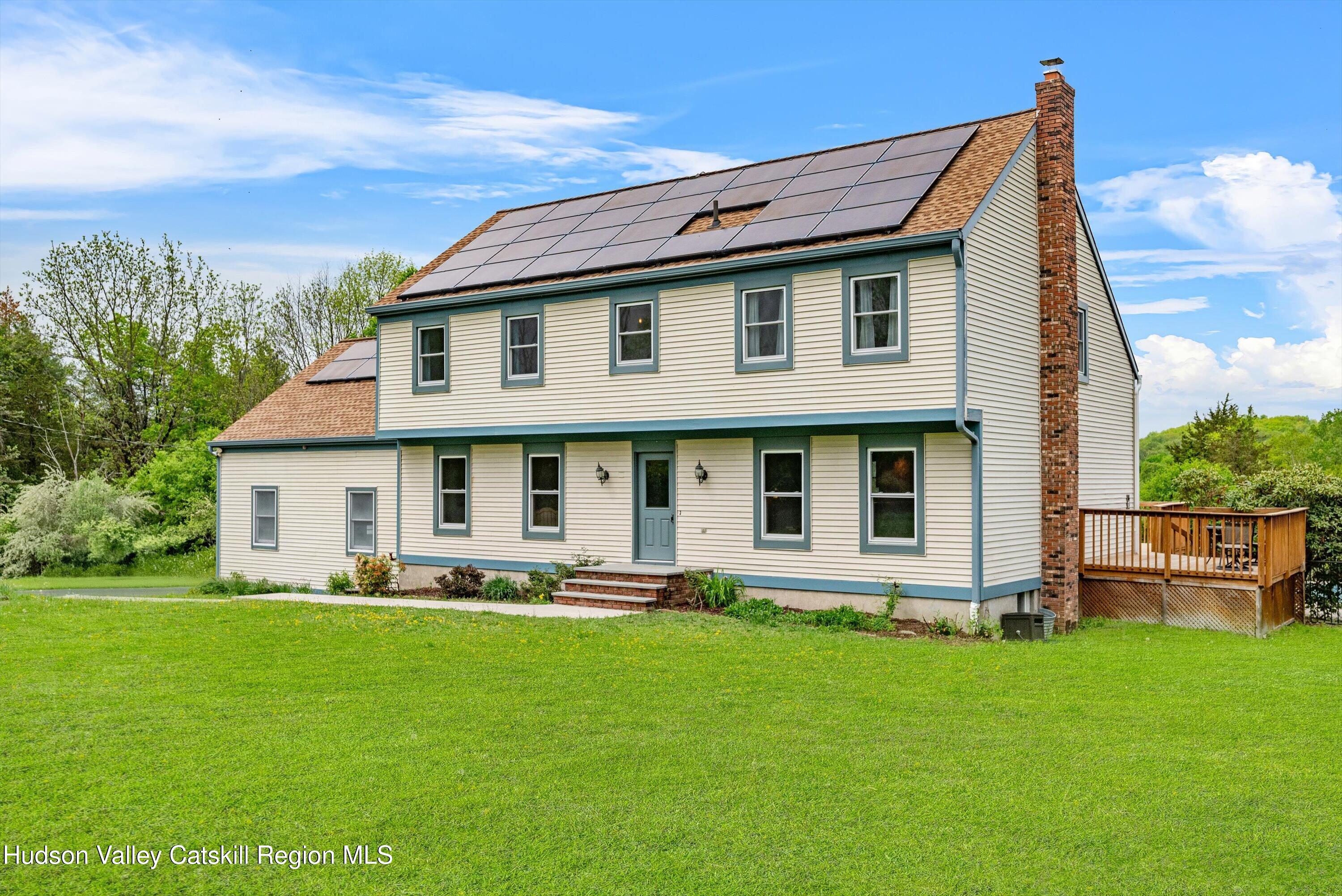 141 East Ridge Road Warwick, NY 10990 - Photo 6 of 57 a front view of house with yard and outdoor seating