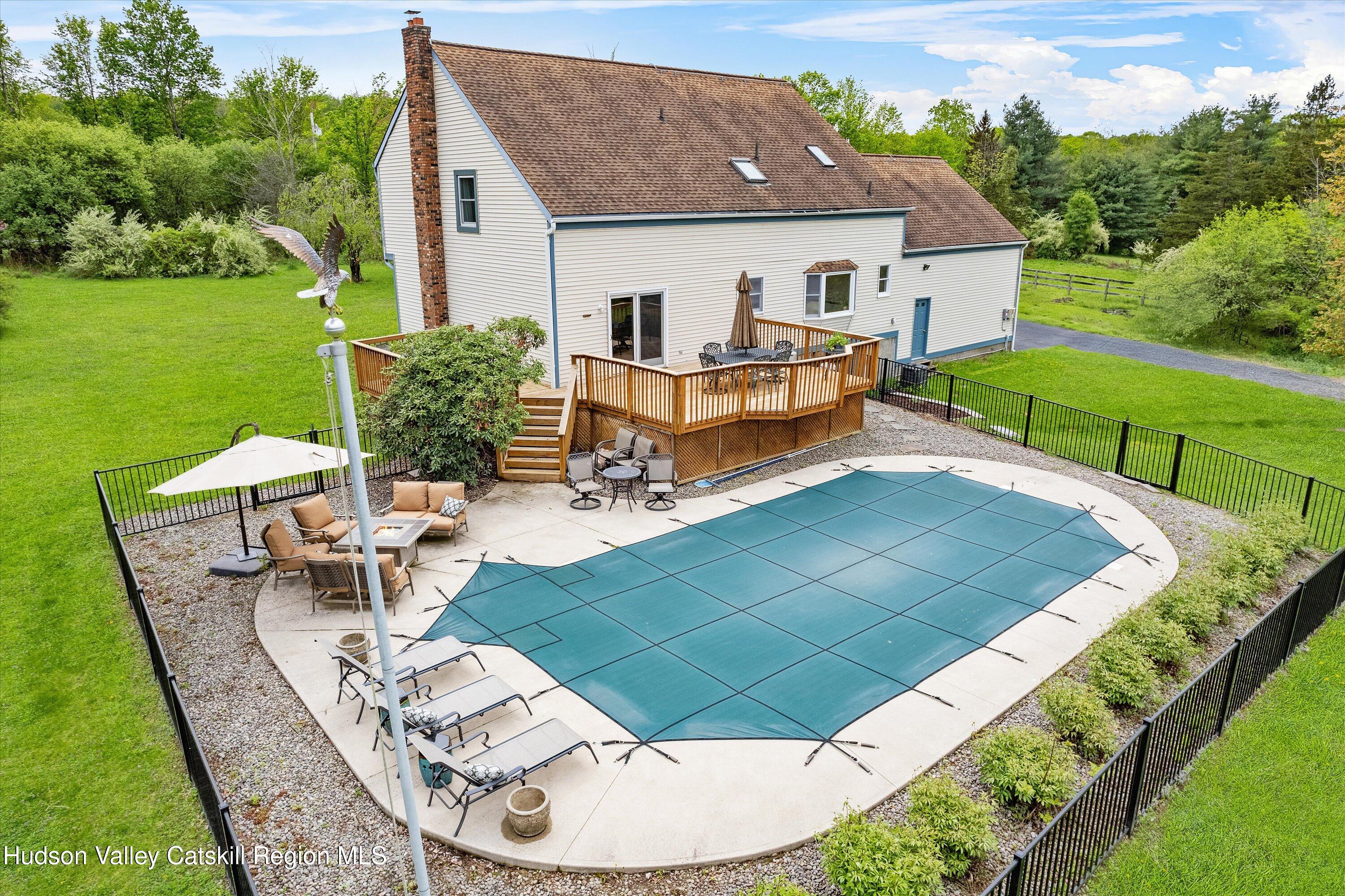 141 East Ridge Road Warwick, NY 10990 - Photo 8 of 57 a view of a house with backyard porch and patio