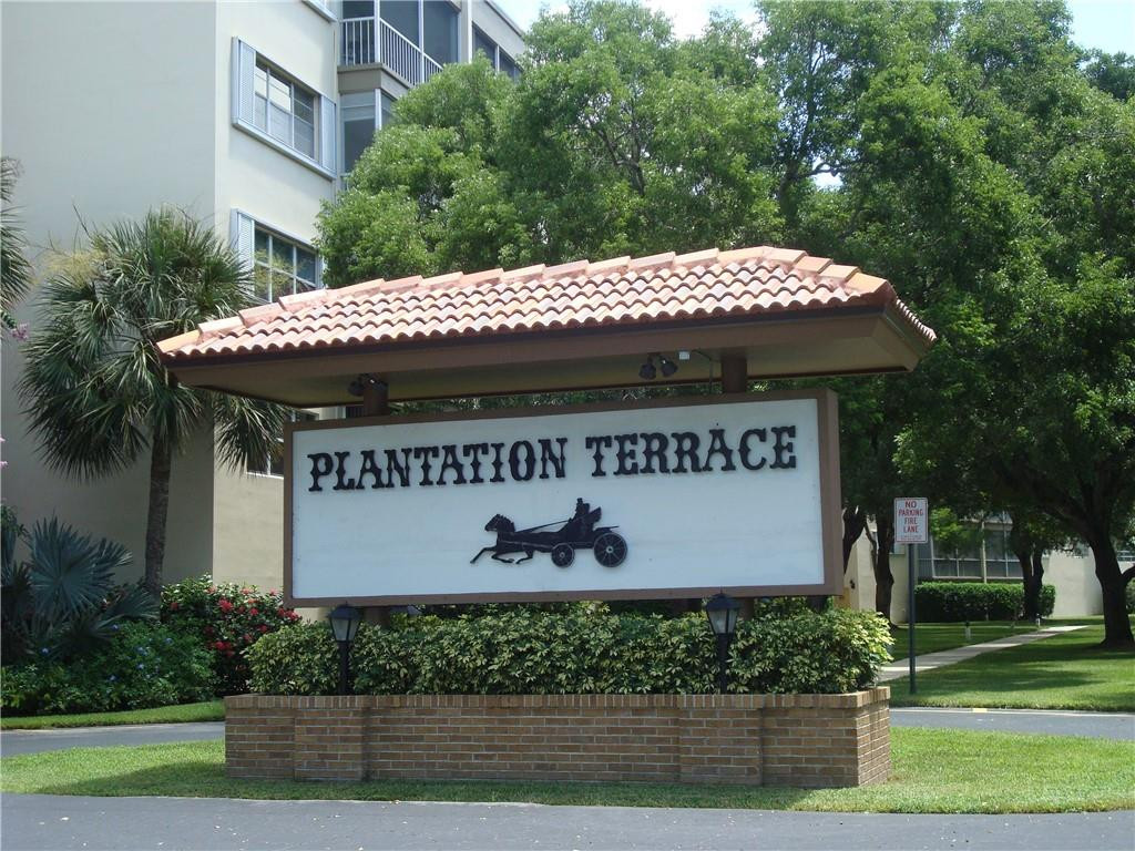 6731 Cypress Road, Unit 109 Plantation, FL 33317 - Photo 1 of 13 Entry sign