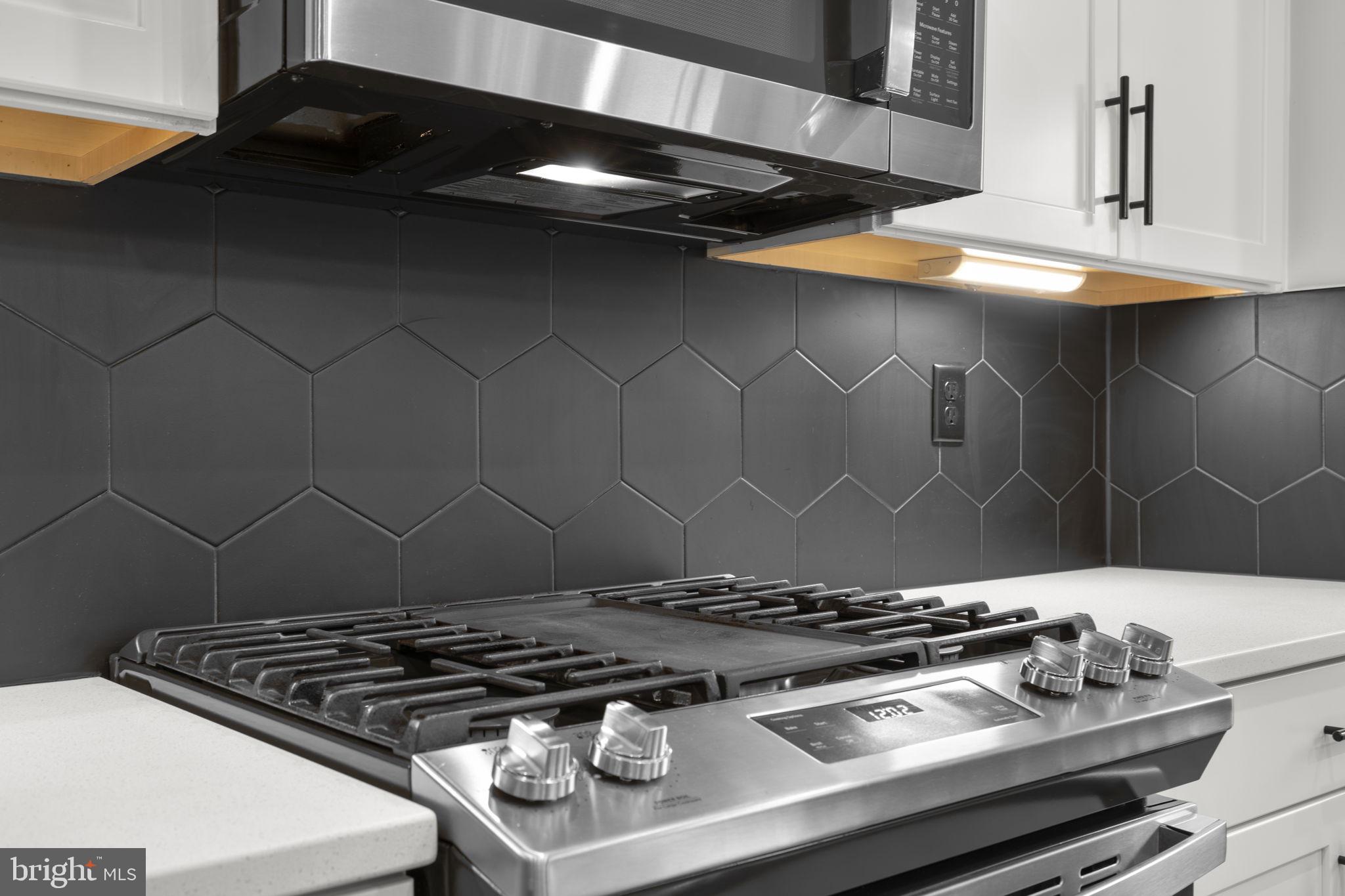 1713 Aurora Way Frederick, MD 21702 - Photo 21 of 57 a stove top oven sitting inside of a kitchen
