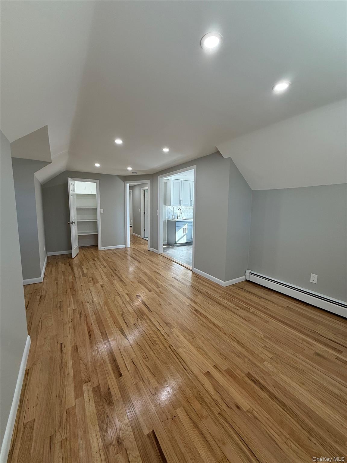 44 Pine Street Blue Point, NY 11715 - Photo 8 of 17 a view of empty room with wooden floor
