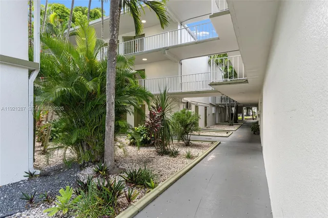 a view of a hallway with windows