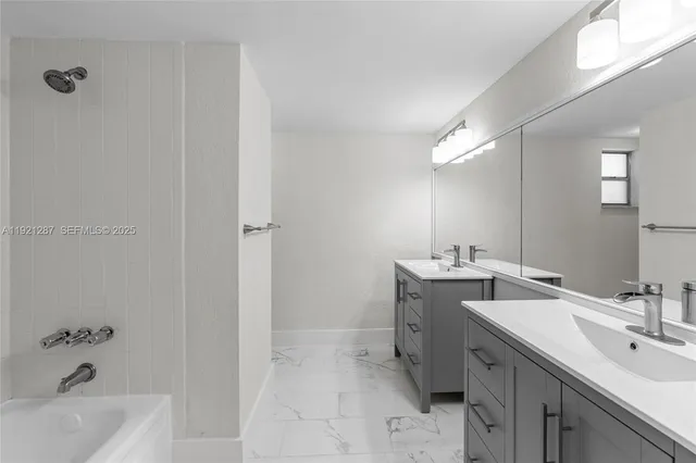 a bathroom with a sink and a tub