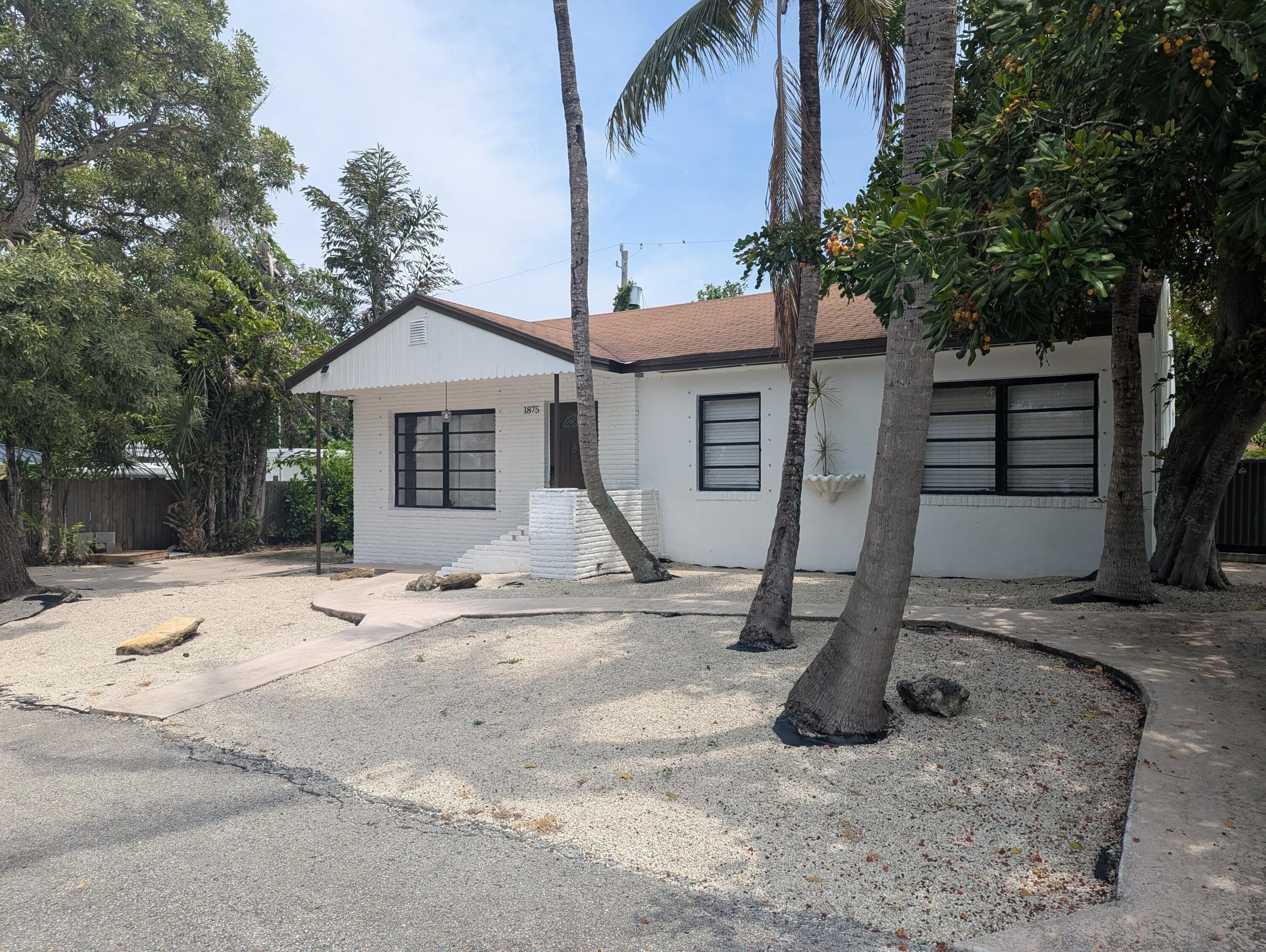 1875 Ridge Road Juno Beach, FL 33408 - Photo 2 of 11 PXL_20260618_160439892.MP~2