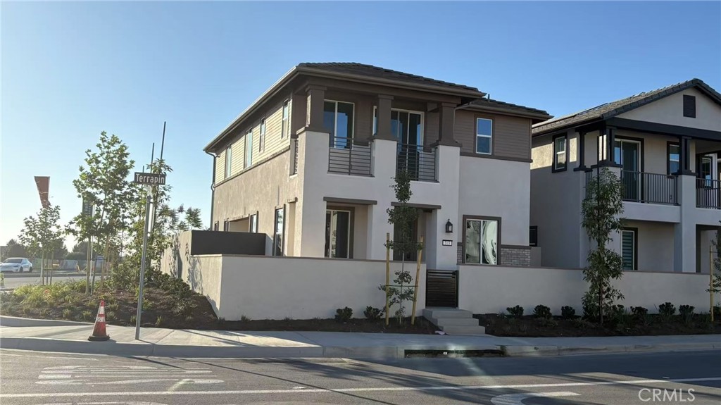 313 Terrapin Irvine, CA 92618 - Photo 2 of 14 a front view of a house with a yard
