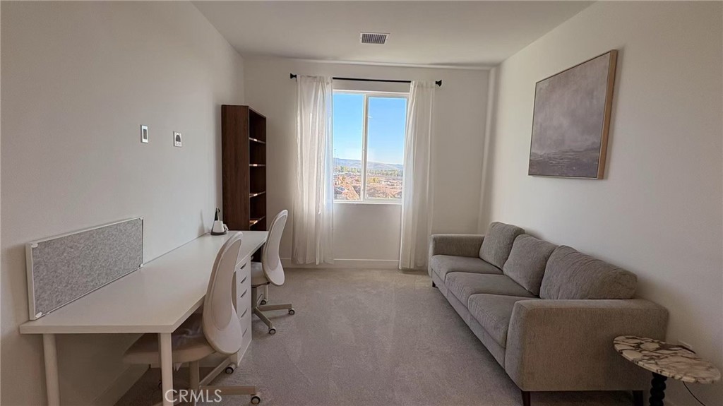 313 Terrapin Irvine, CA 92618 - Photo 10 of 14 a living room with furniture and a window