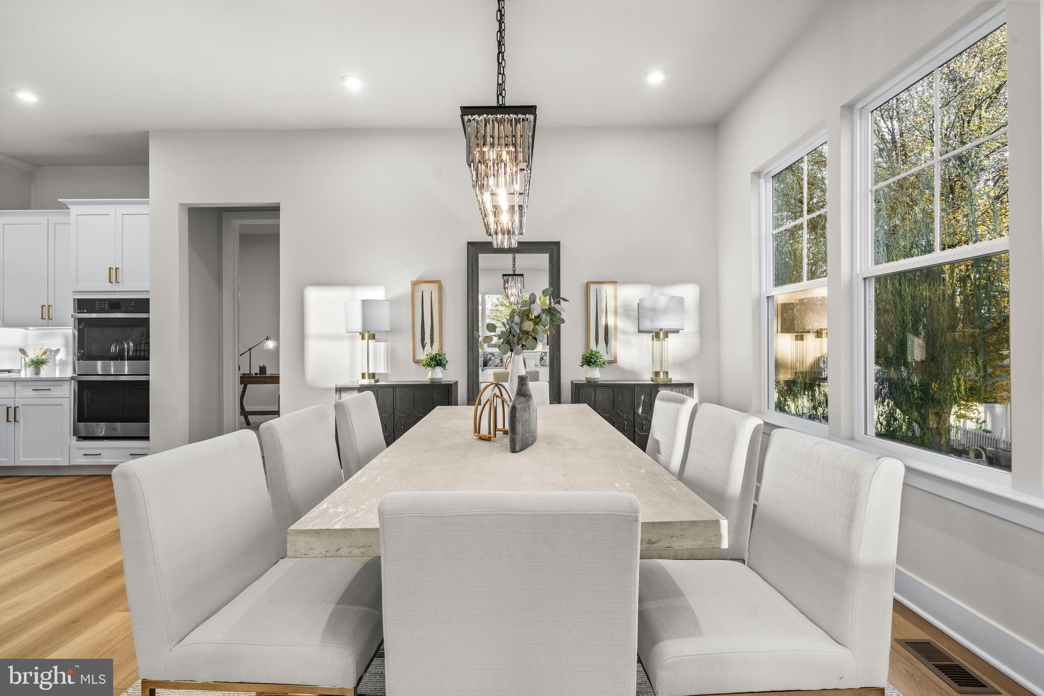 7505 Magarity Road Falls Church, VA 22043 - Photo 17 of 69 a view of a dining room with furniture window and wooden floor