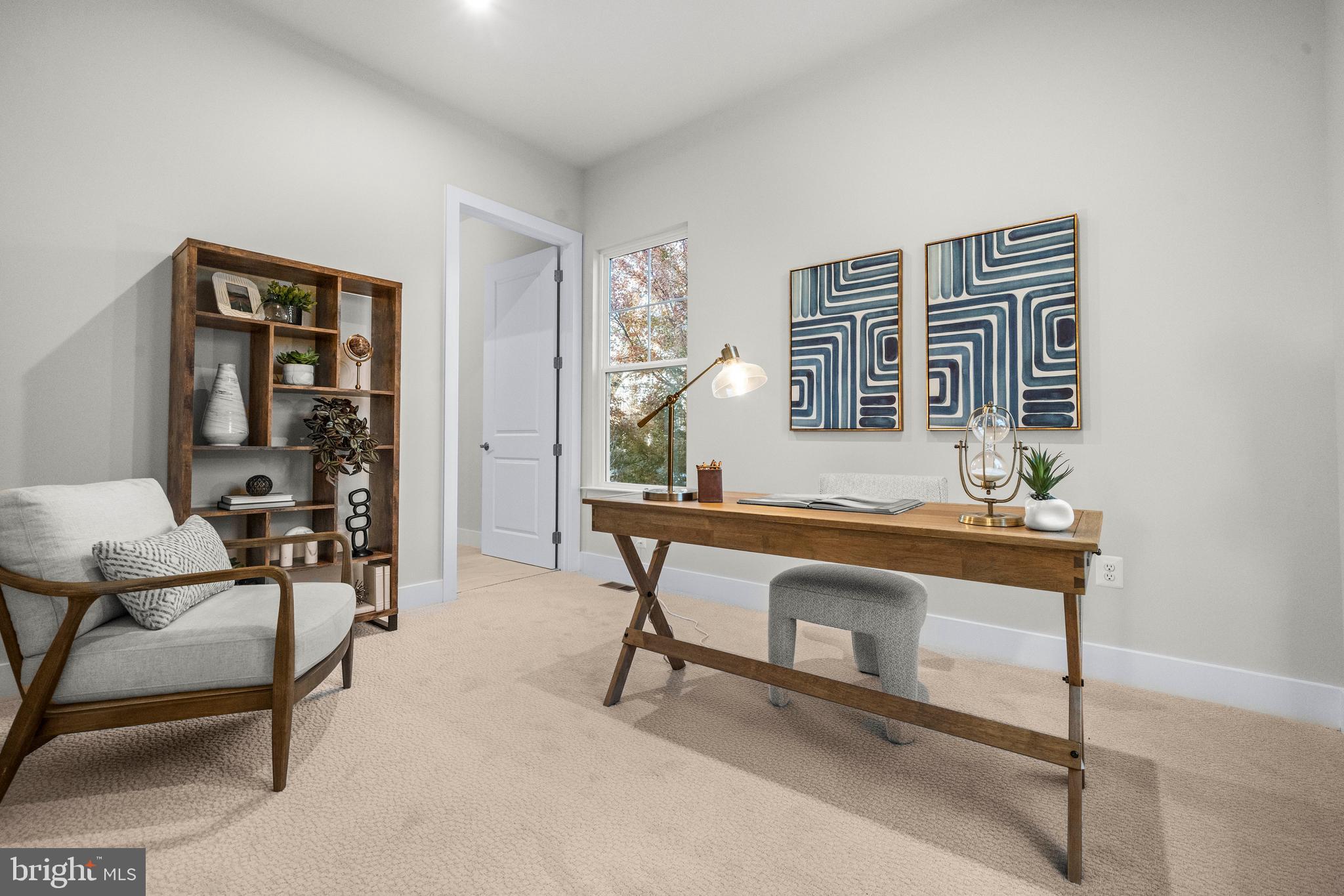 7505 Magarity Road Falls Church, VA 22043 - Photo 18 of 69 a living room with furniture a window and a potted plant