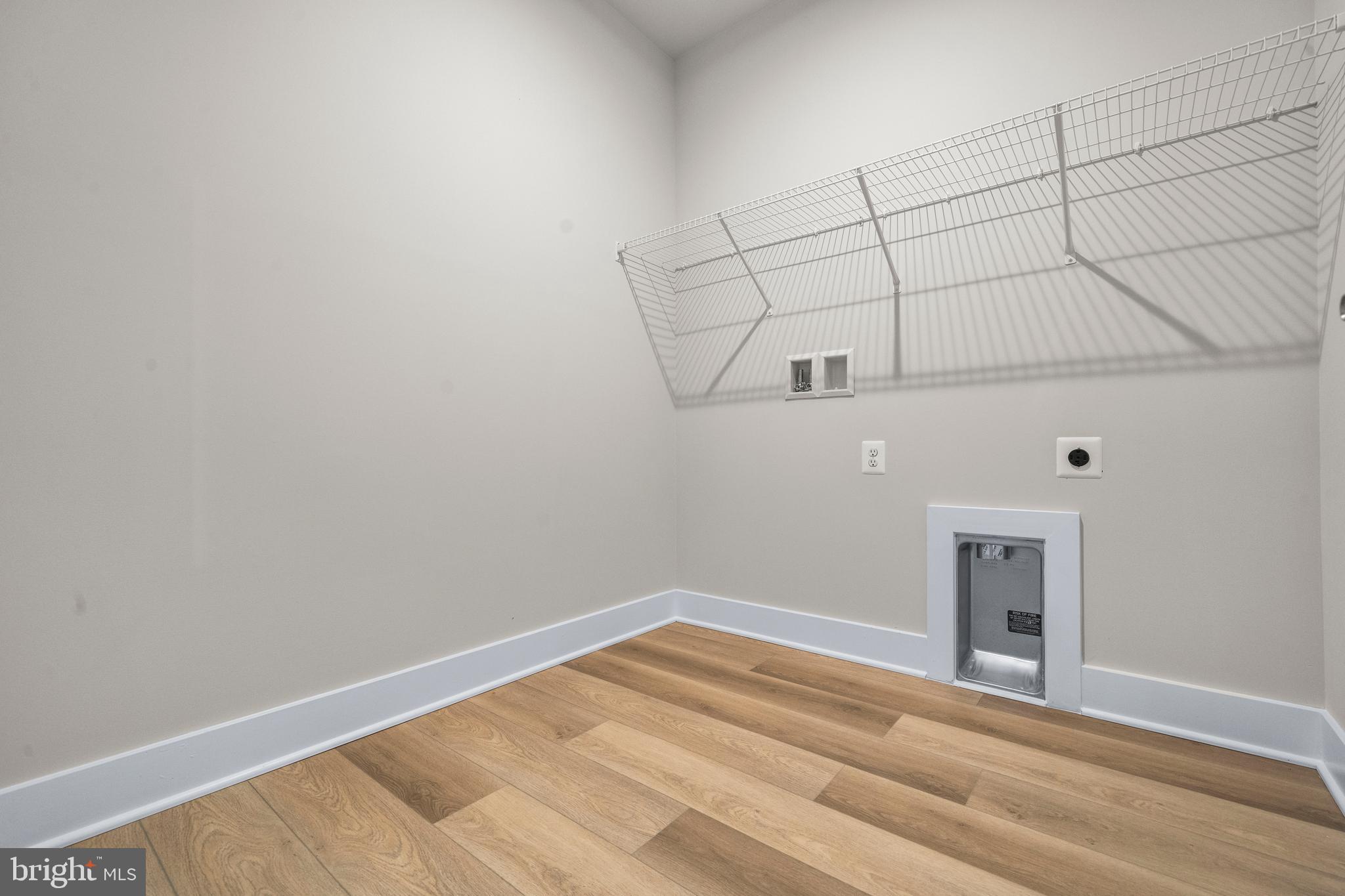 7505 Magarity Road Falls Church, VA 22043 - Photo 35 of 69 a view of a room with racks on the wall