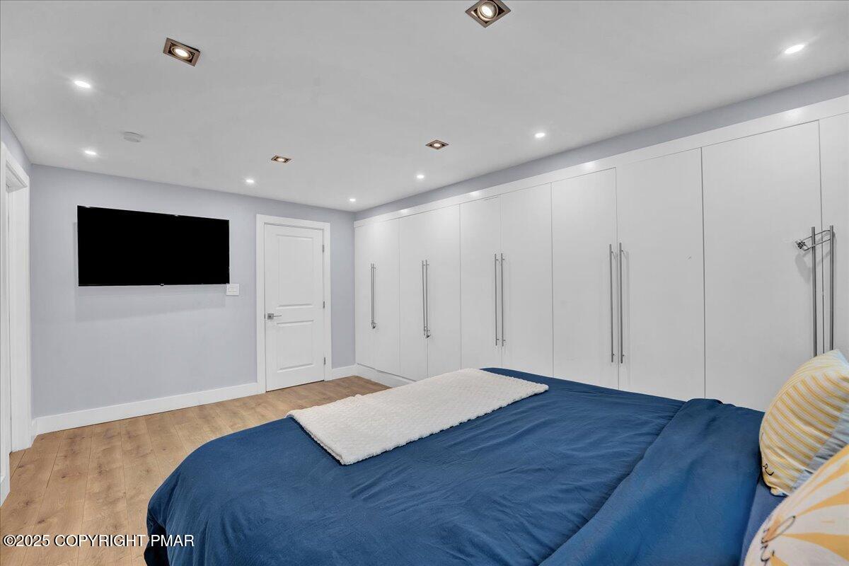 3118 Cherry Ridge Road Bushkill, PA 18324 - Photo 13 of 51 a view of a livingroom with wooden floor