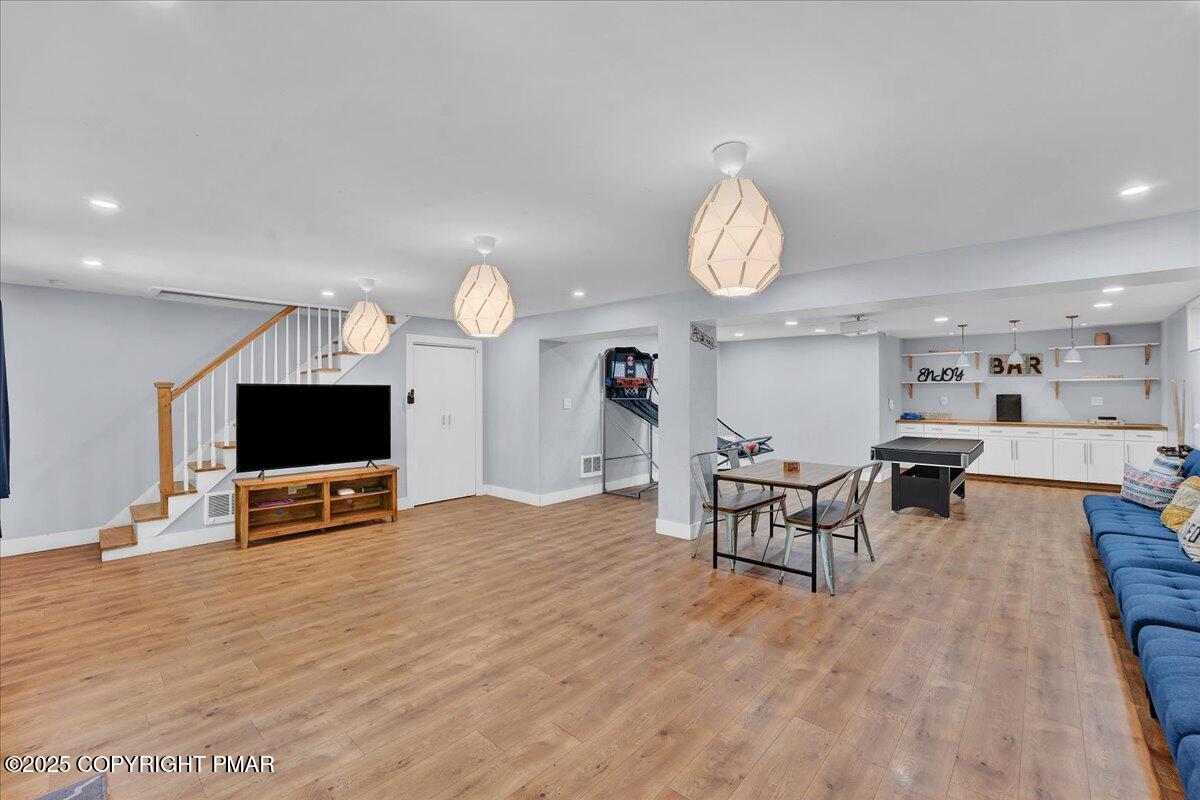 3118 Cherry Ridge Road Bushkill, PA 18324 - Photo 23 of 51 a view of a livingroom with furniture and a flat screen tv