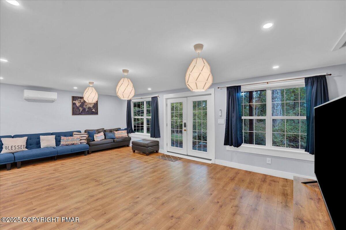 3118 Cherry Ridge Road Bushkill, PA 18324 - Photo 24 of 51 a view of a room with furniture and a large window