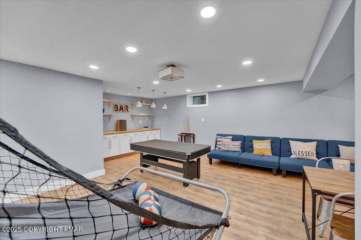 3118 Cherry Ridge Road Bushkill, PA 18324 - Photo 26 of 51 a living room with furniture and a rug